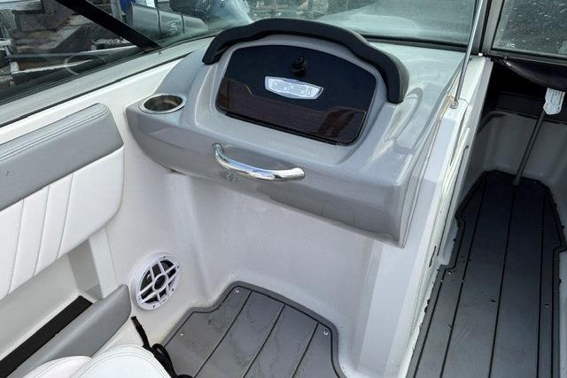 Interior of a 2021 Chaparral 21 SSi boat, featuring sleek design and modern amenities.