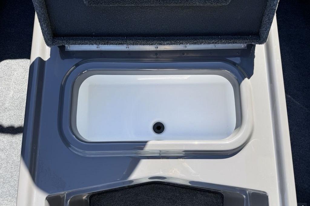 Livewell compartment in 2026 Skeeter ZX150 boat, open lid view.