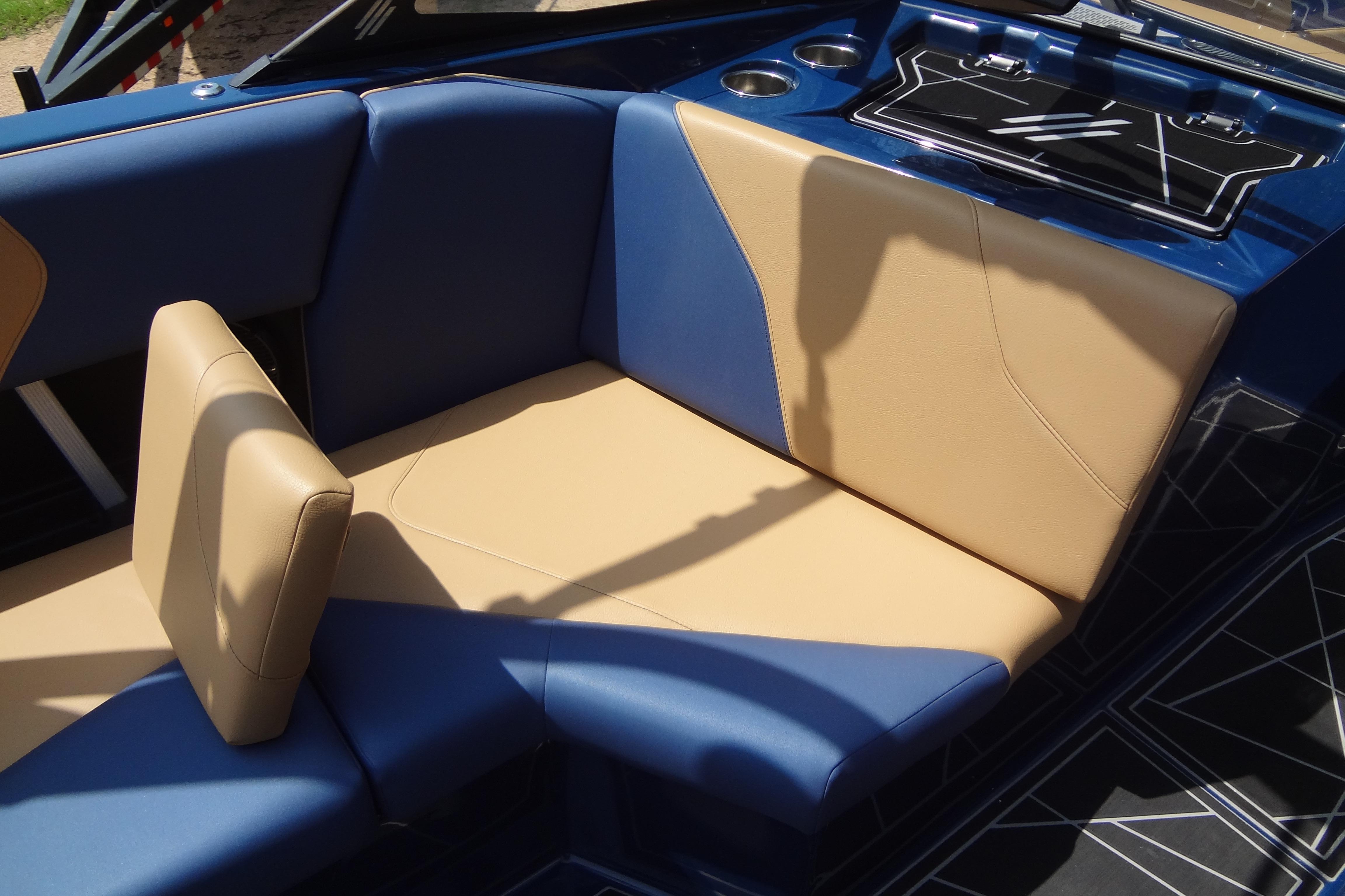 2022 ATX Surf Boats 24 Type-S interior with blue and tan seating.