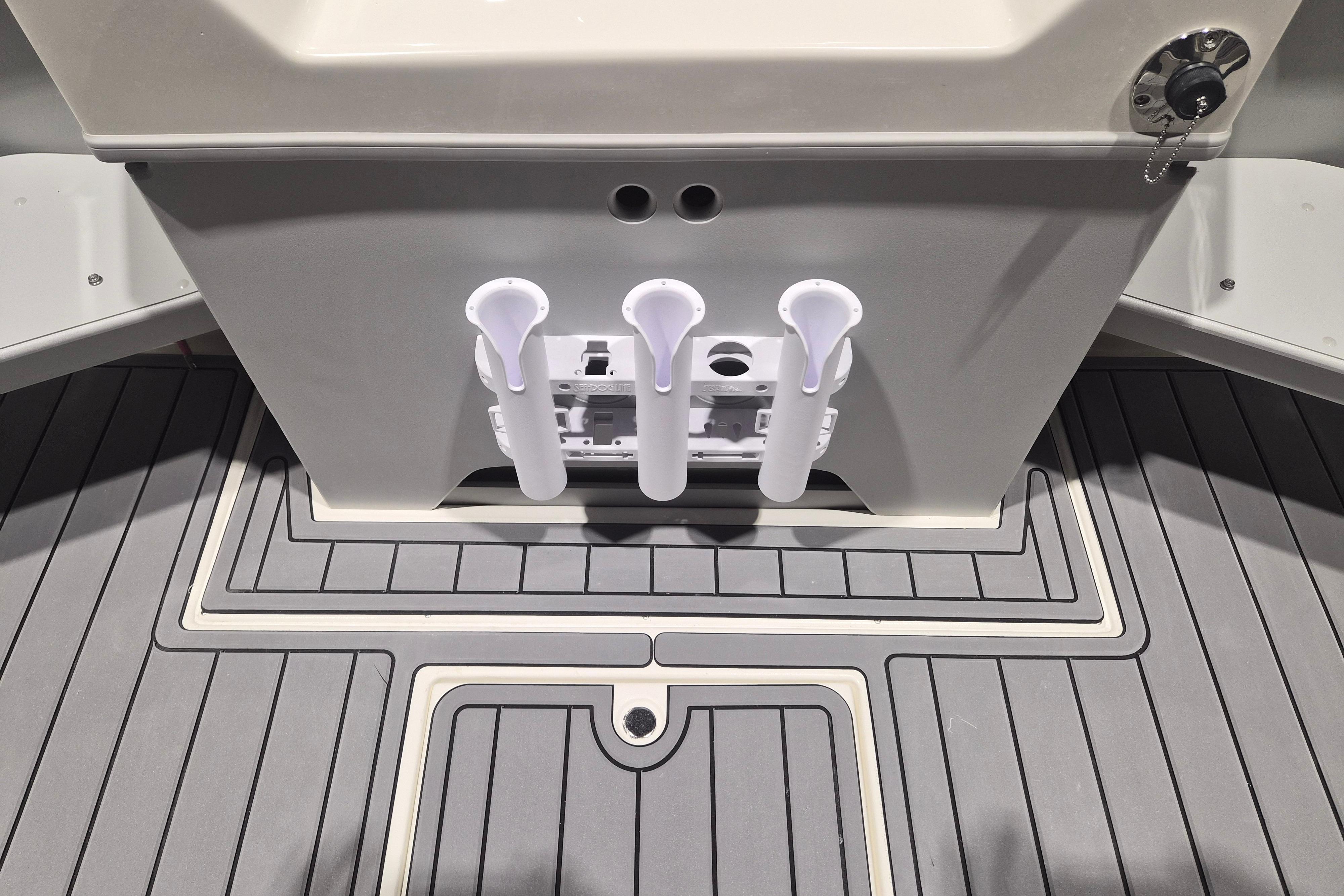 2026 Arima Sea Chaser 19 Yellowtail Edition boat deck with rod holders.