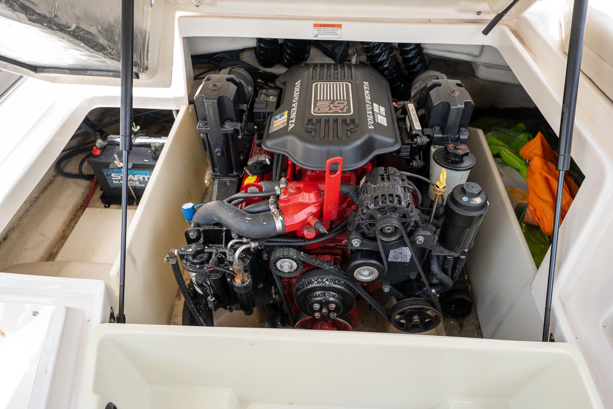 Engine compartment of a 2008 Regal 2000 Bowrider boat, featuring a Volvo Penta engine.