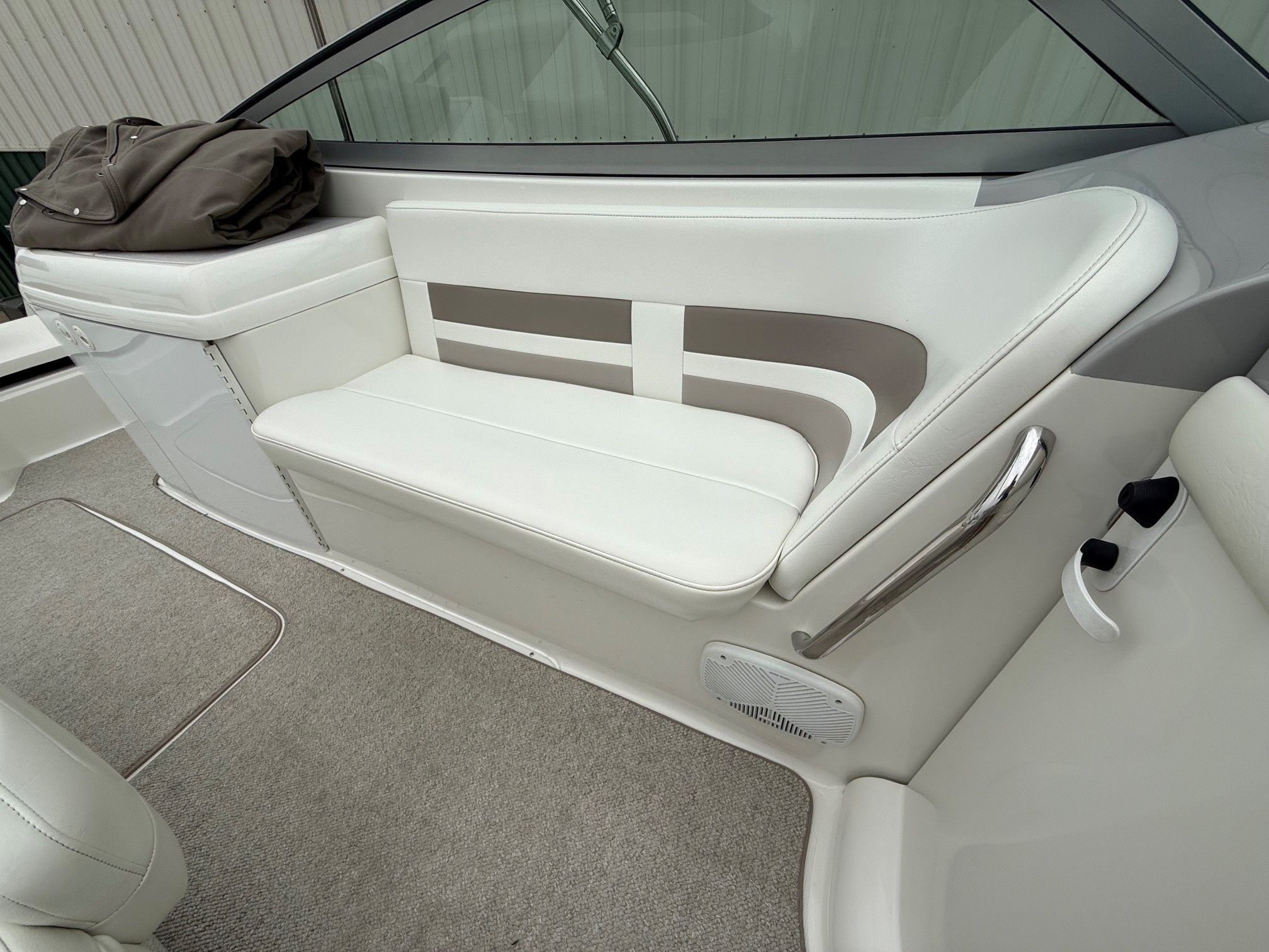 Interior of a 1998 Formula Thunderbird boat with white seating.