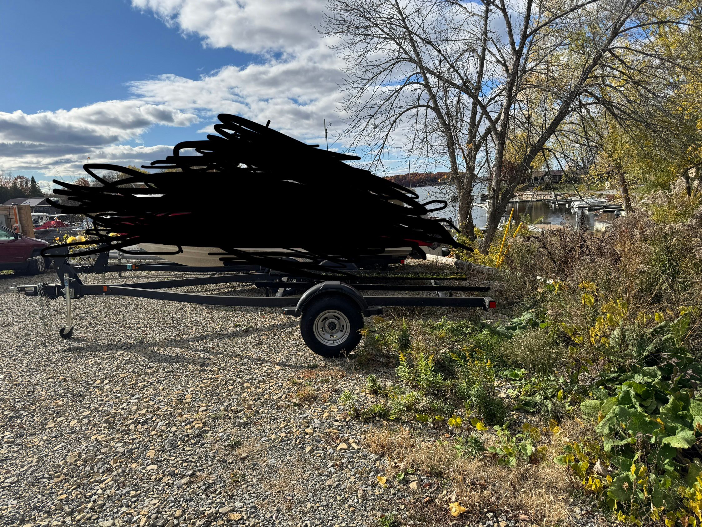 Yamaha Boats SX190 2020 on trailer, autumn landscape.