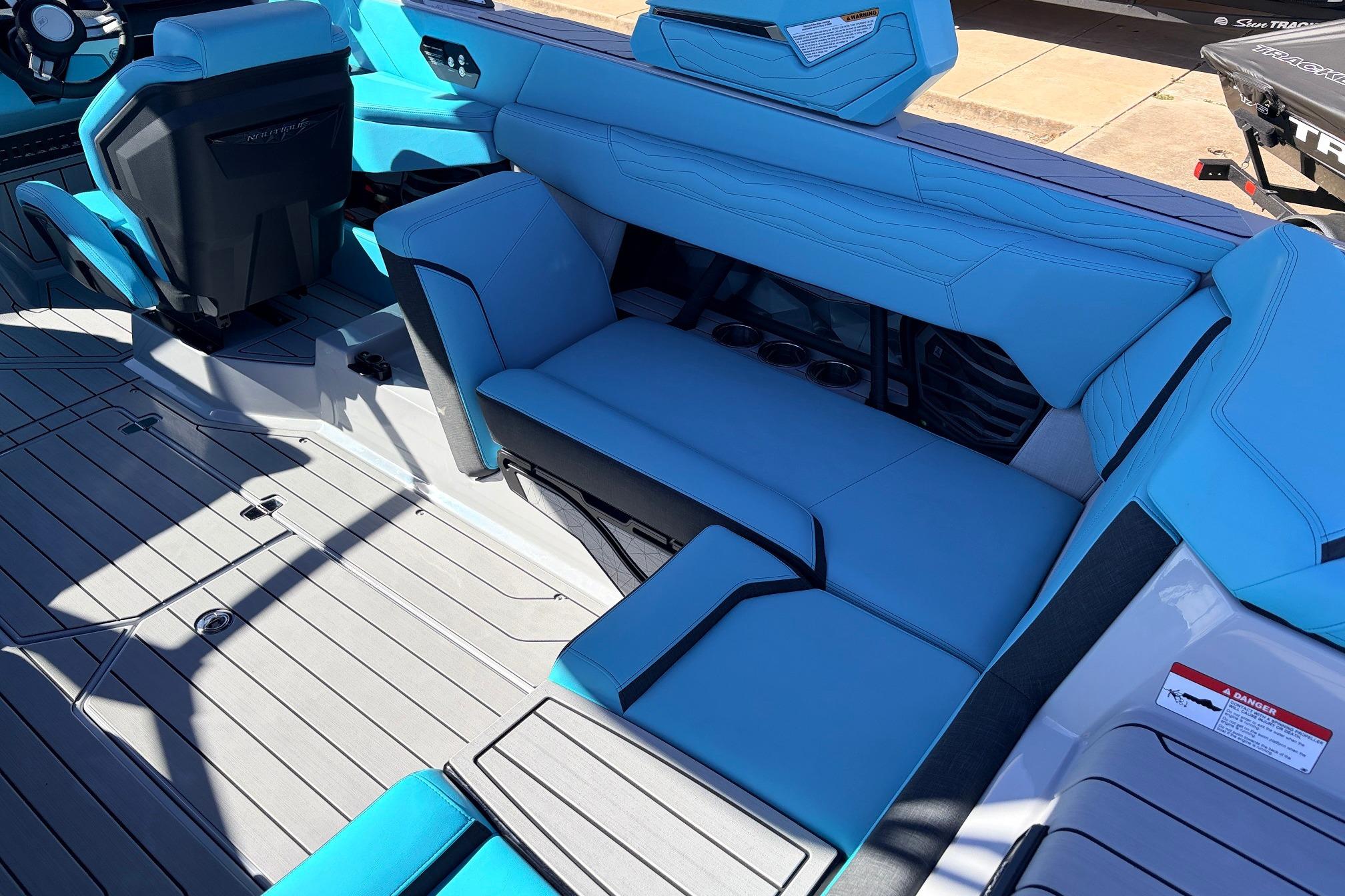 2026 Nautique Super Air Nautique G23 interior with blue seating and modern design.