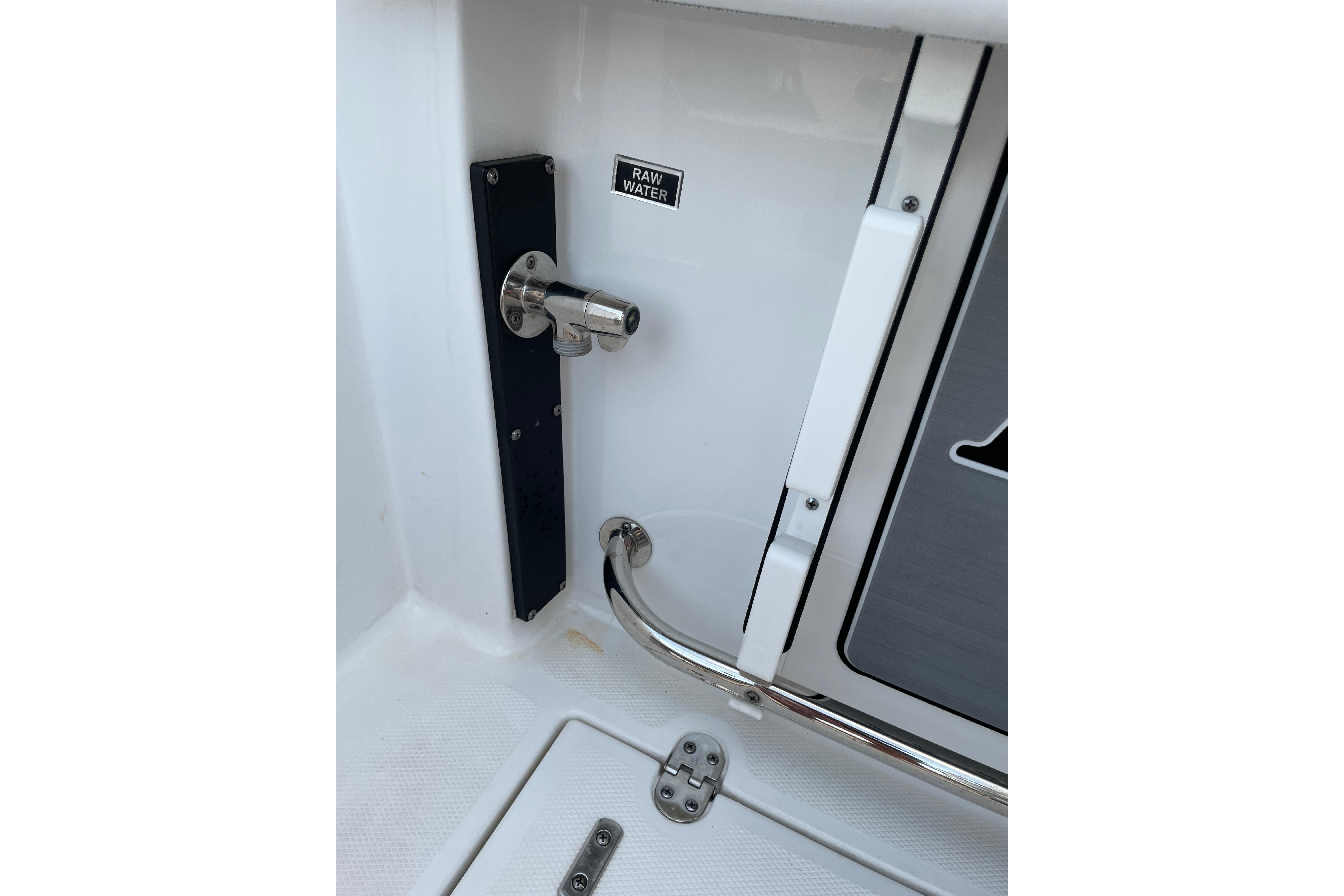 2022 Blackfin 252 CC boat raw water outlet and stainless steel fittings.