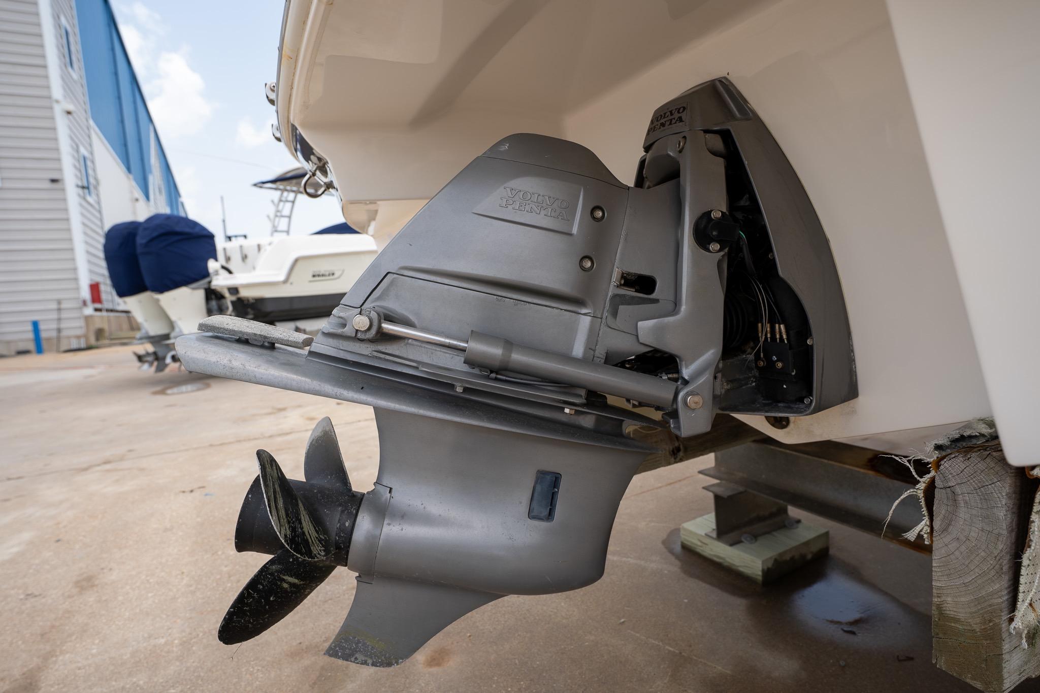 2008 Regal 2000 Bowrider boat with Volvo Penta outdrive, docked on a sunny day.
