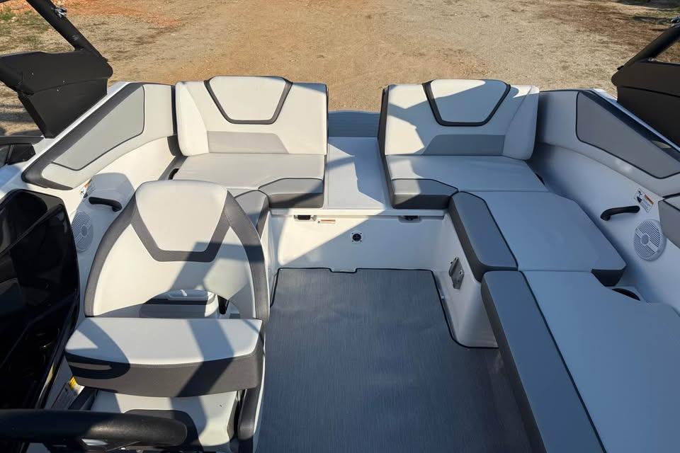 2026 Yamaha Boats AR220 interior with modern seating and sleek design.
