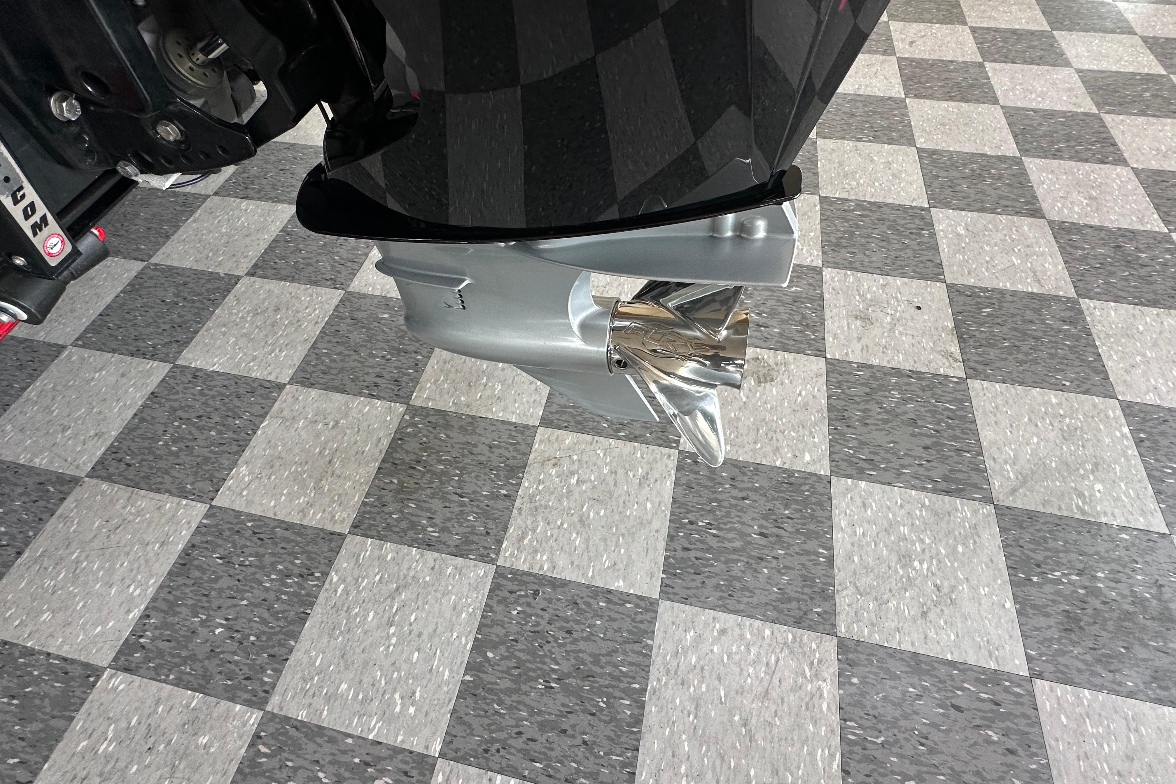 2025 Nitro Z20 XL Pro boat motor on checkered floor.