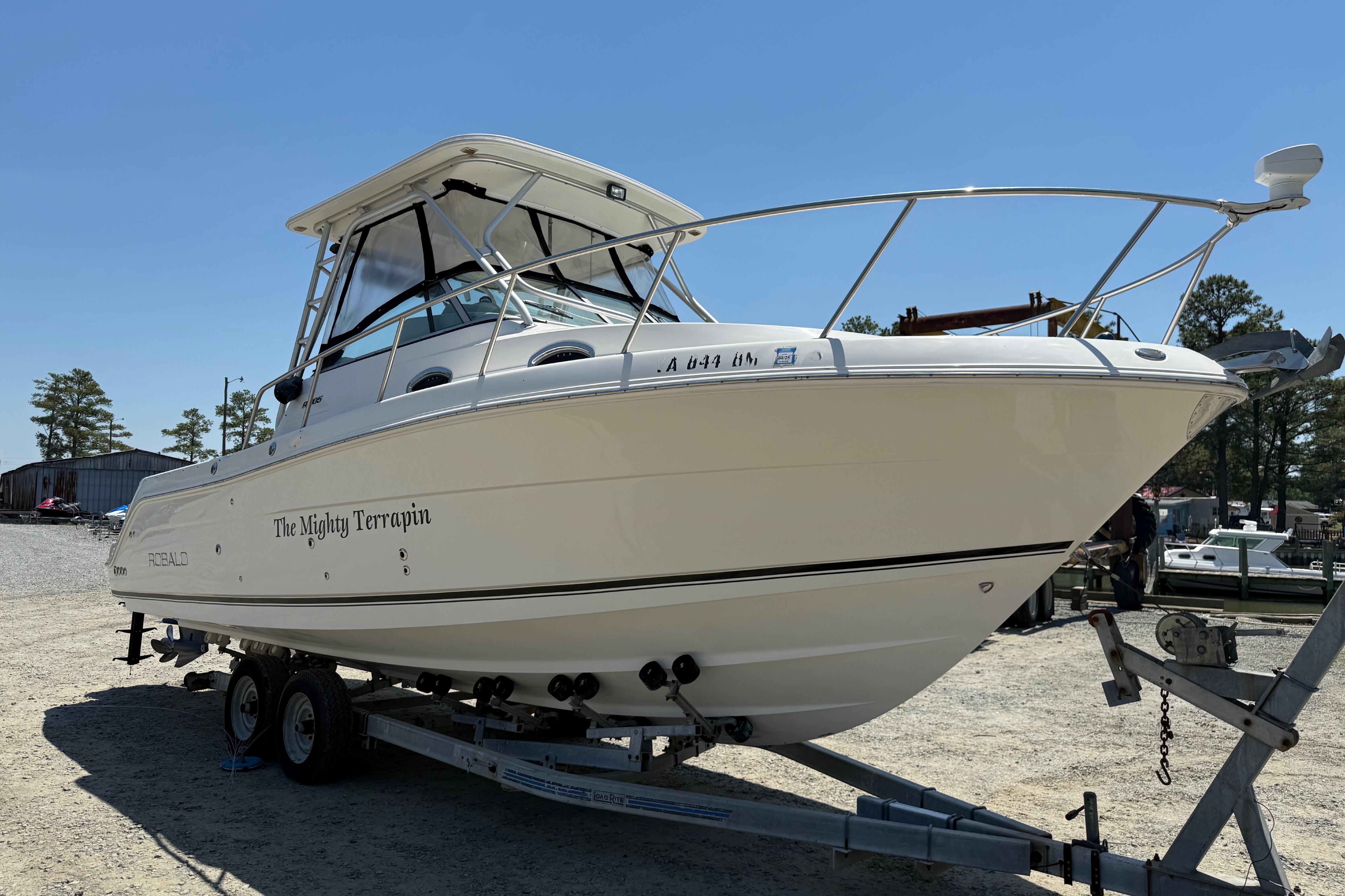 2007 Robalo R305 Walkaround boat on trailer, named "The Mighty Terrapin."