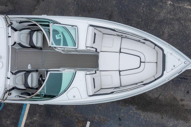 2026 Crowline 290 XSS boat, aerial view, showcasing spacious seating and sleek design.