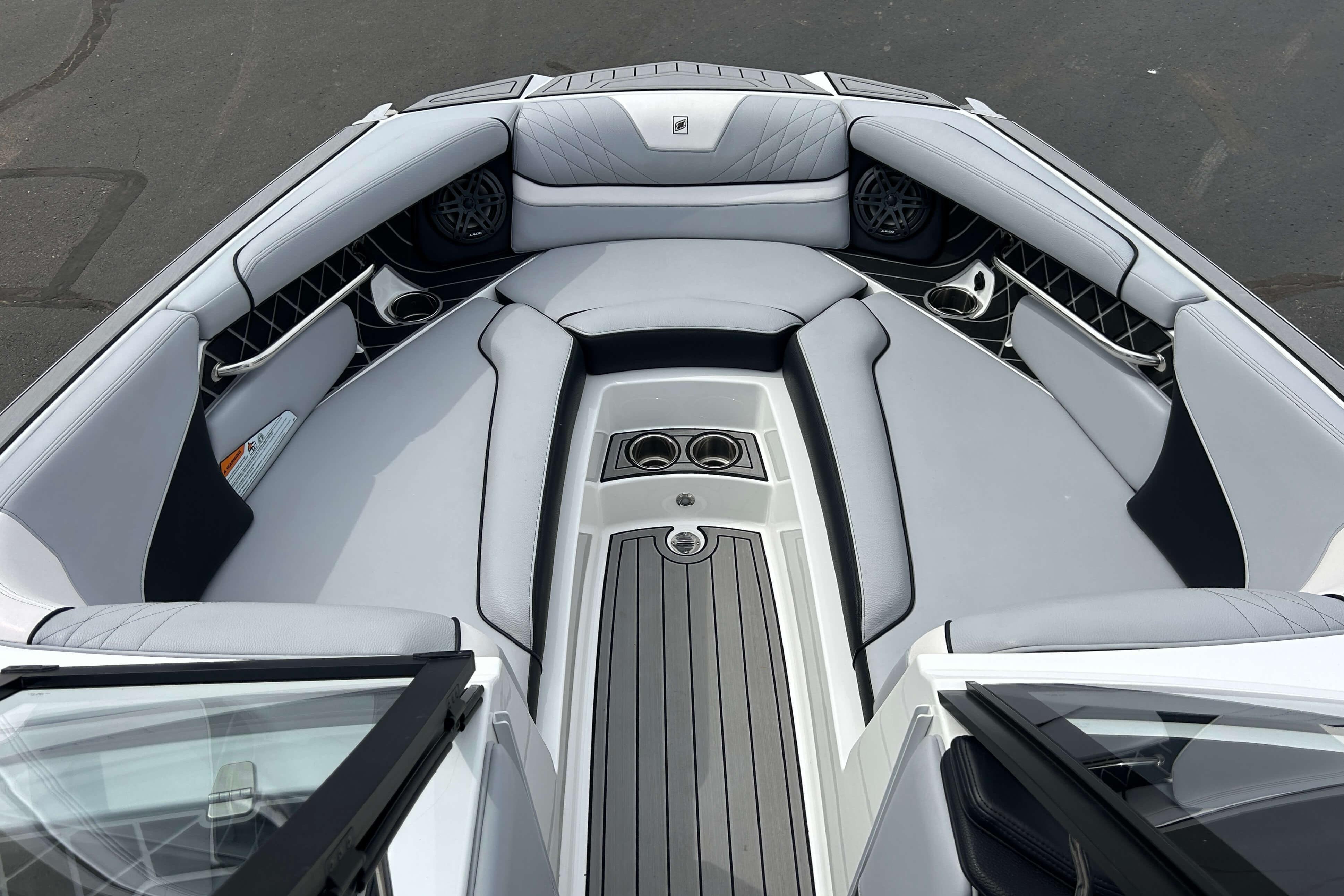 2021 Nautique Super Air Nautique GS24 boat interior with luxurious seating and sleek design.