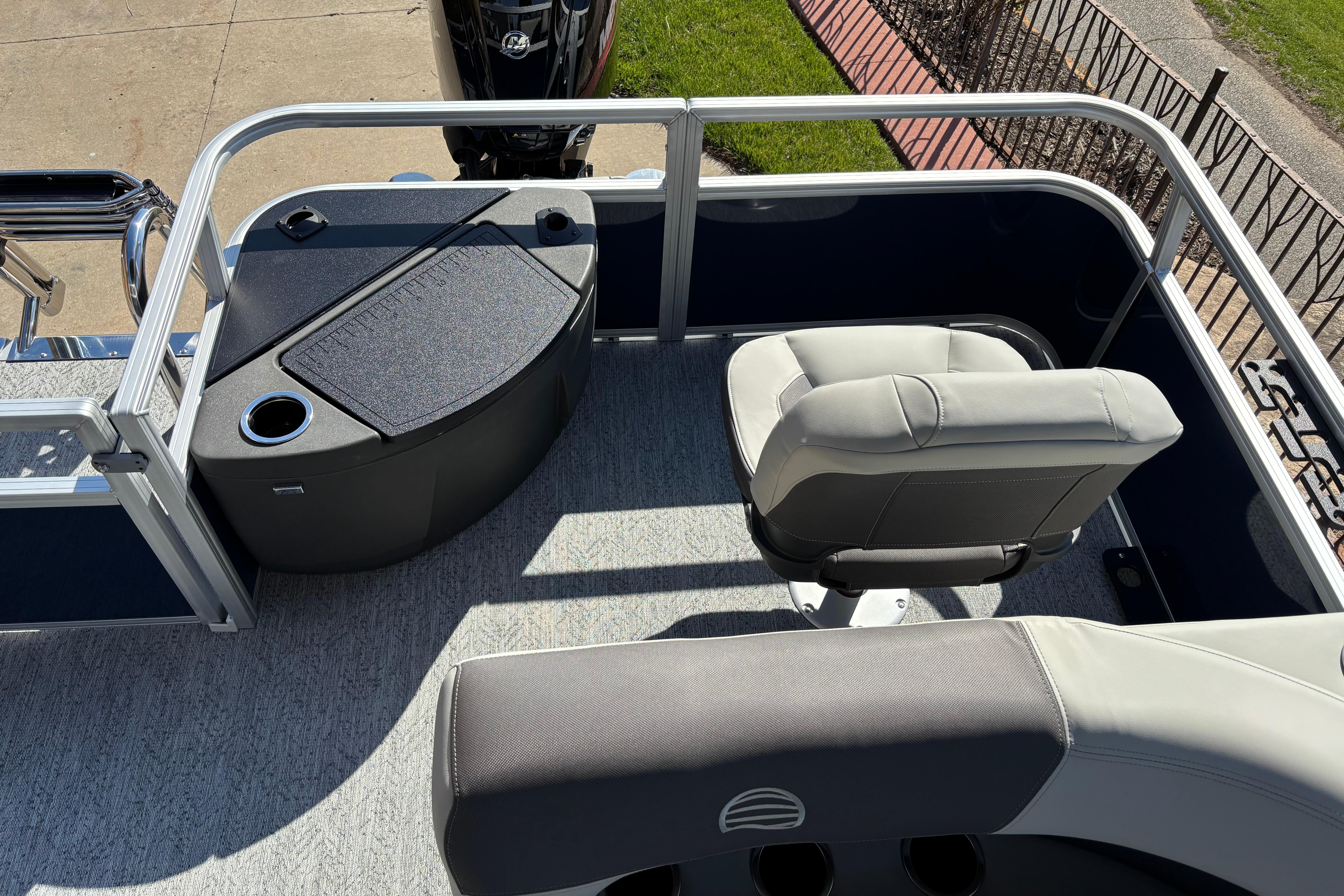 2026 Sun Tracker Bass Buggy 18 DLX boat interior with seating and console.