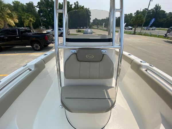 2024 Key West 203 FS boat interior with seating and console.