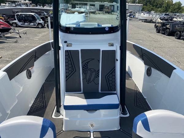 2021 Scarab 255 Open ID boat interior with seating and storage compartments.