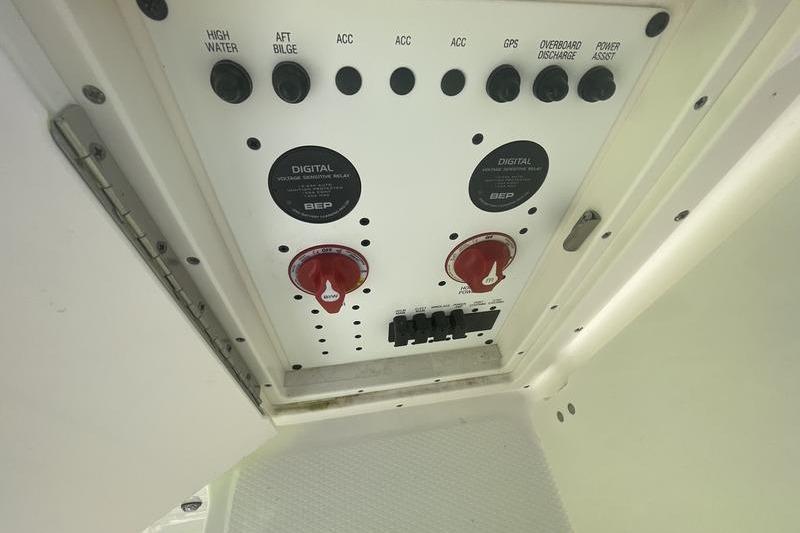 2023 Robalo R270 Center Console control panel with switches and dials.