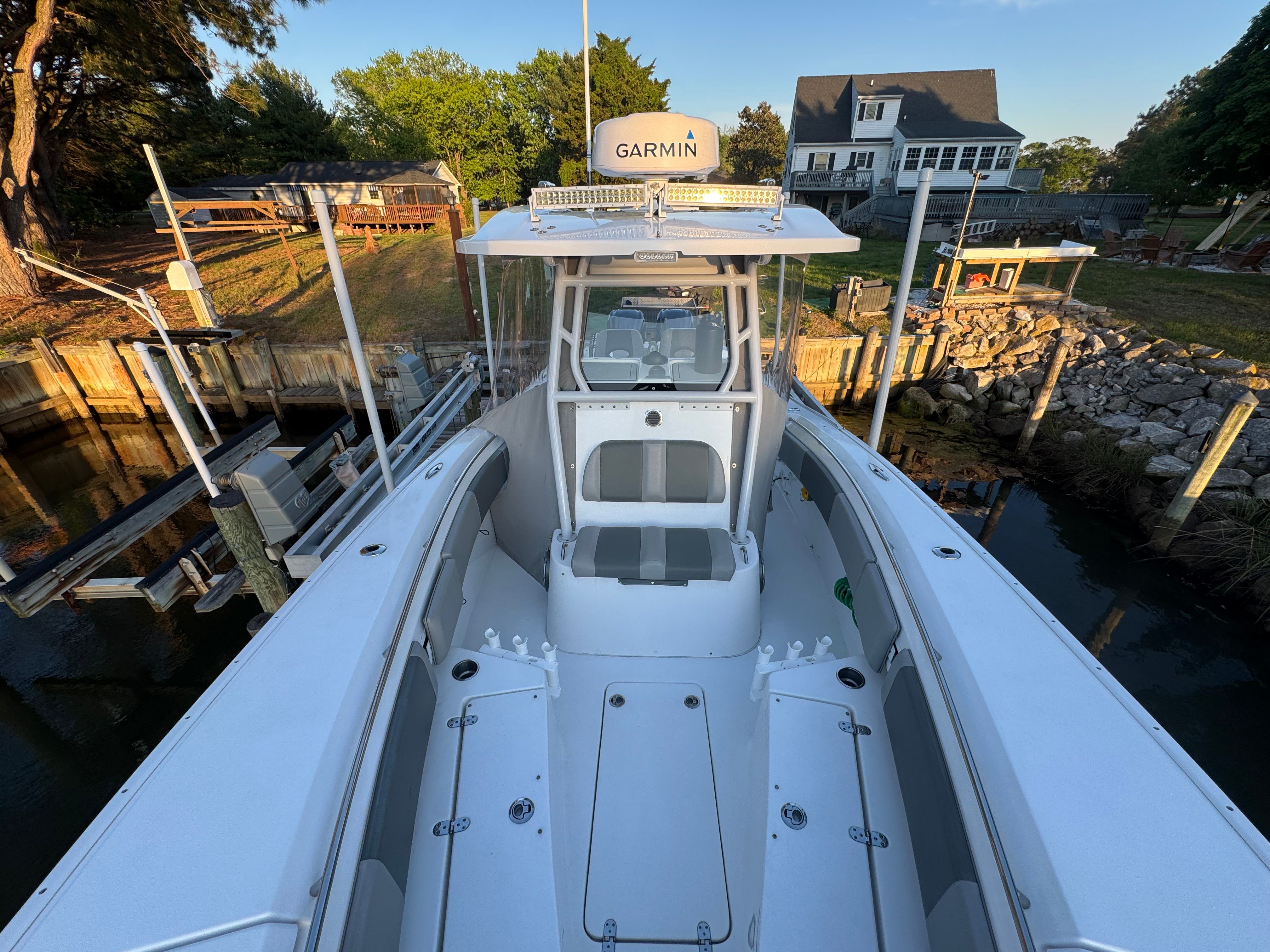 2021 Cape Horn 32 XS boat docked, front view.