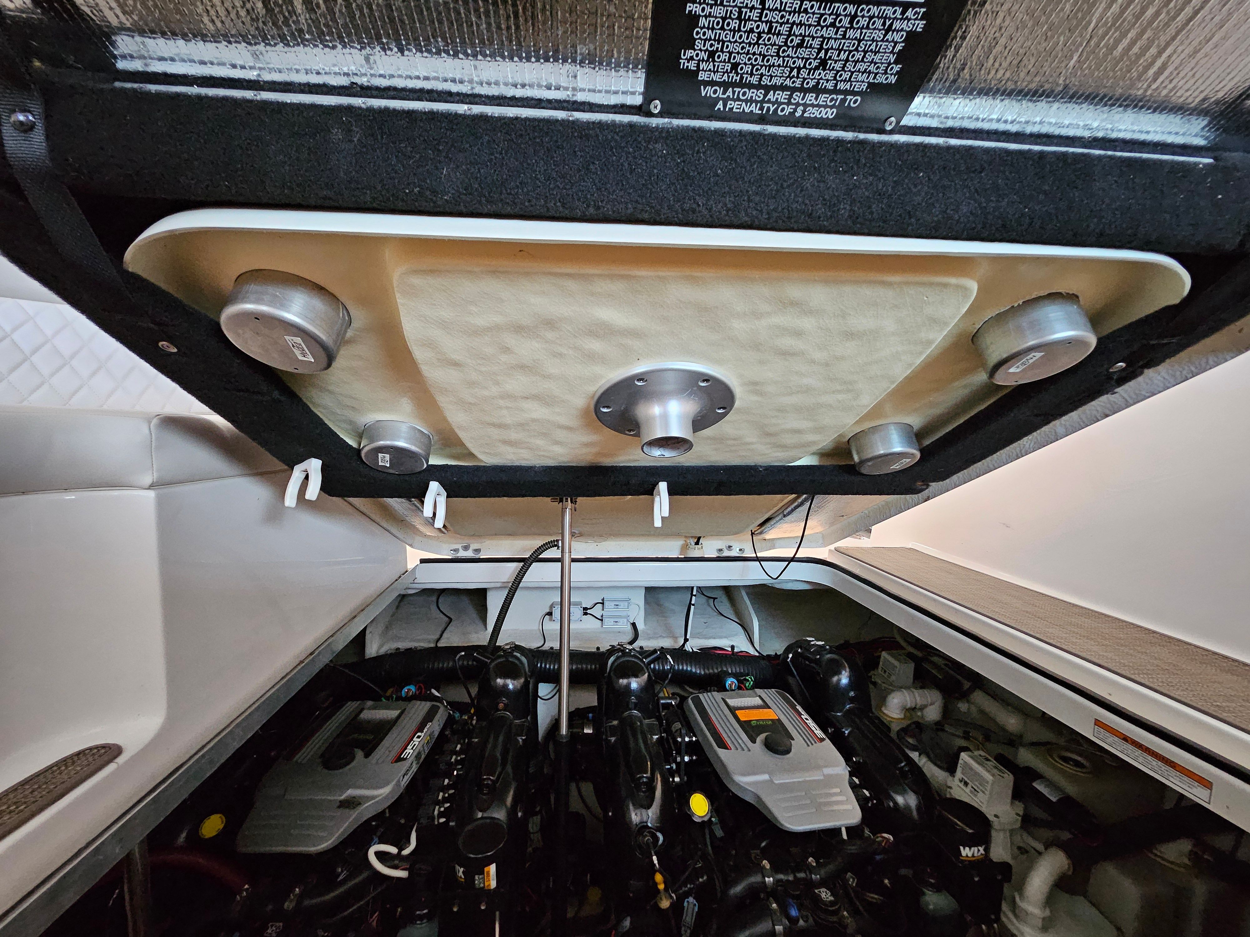Engine compartment of 2014 Chaparral 330 Signature with dual engines.