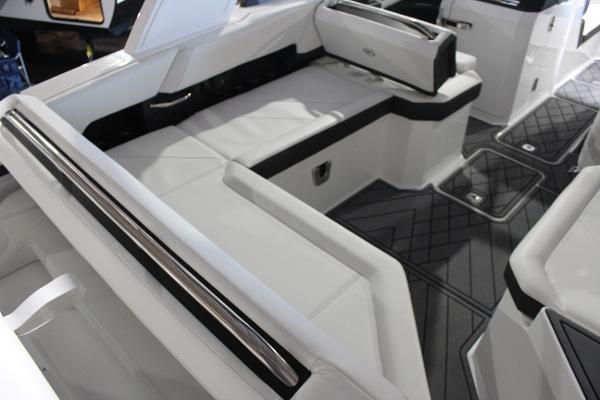 Luxurious interior of 2025 Cobalt R6 boat with sleek seating and modern design.