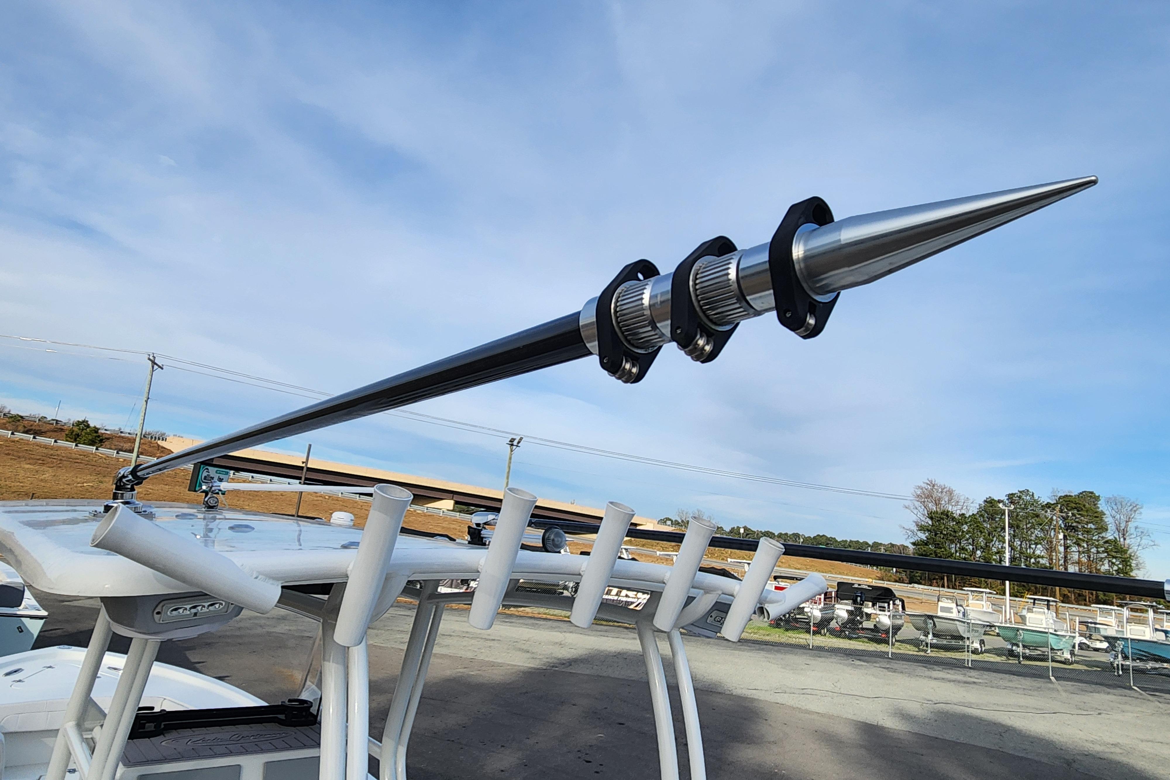 2024 Pair Customs 27 CC boat with sleek metal antenna against a clear sky.