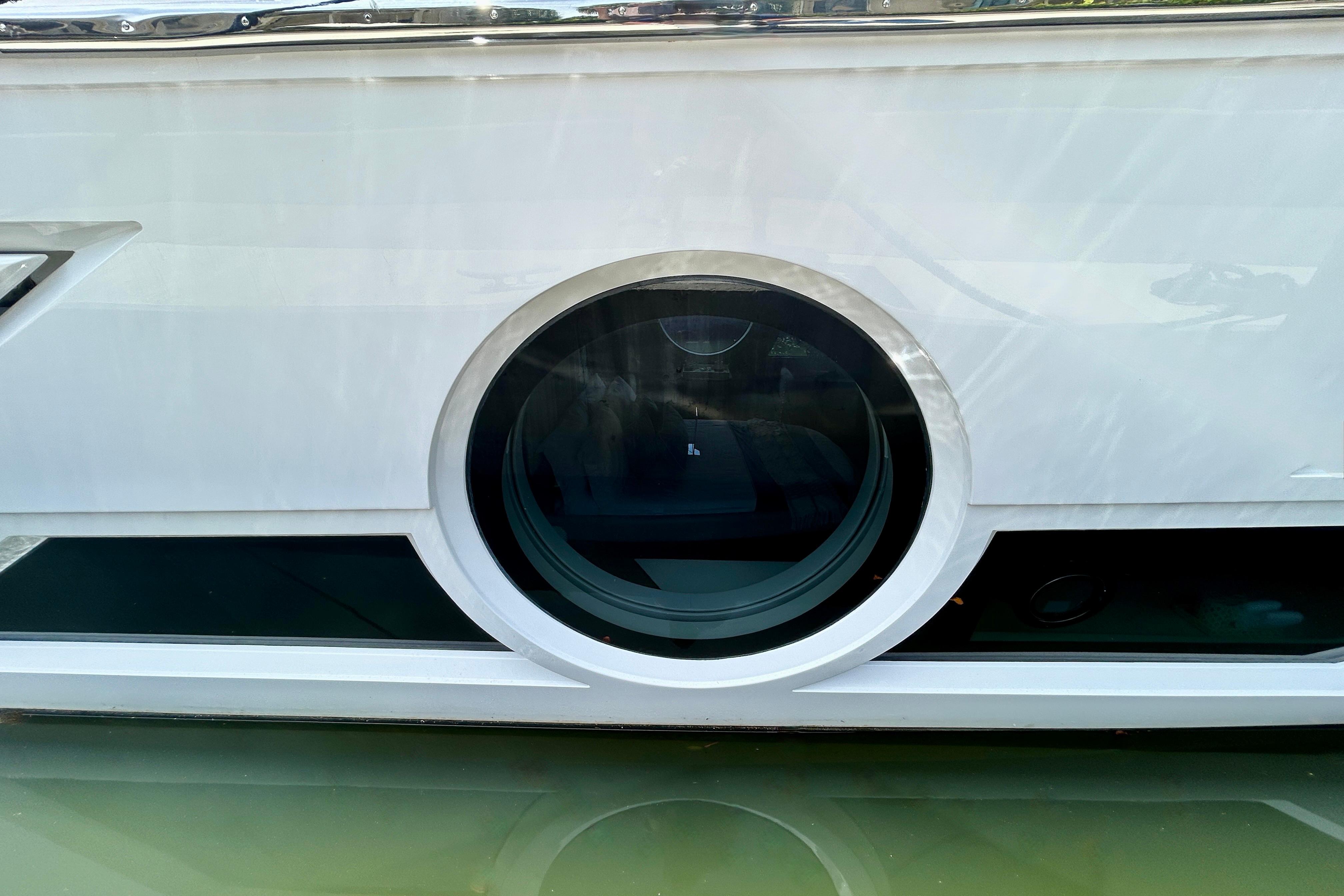 2024 Aicon Vivere 66 yacht with sleek circular window design.