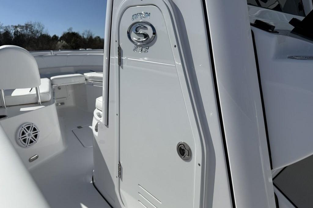 2026 Sportsman Open 232 Center Console boat interior, featuring sleek white design and seating.