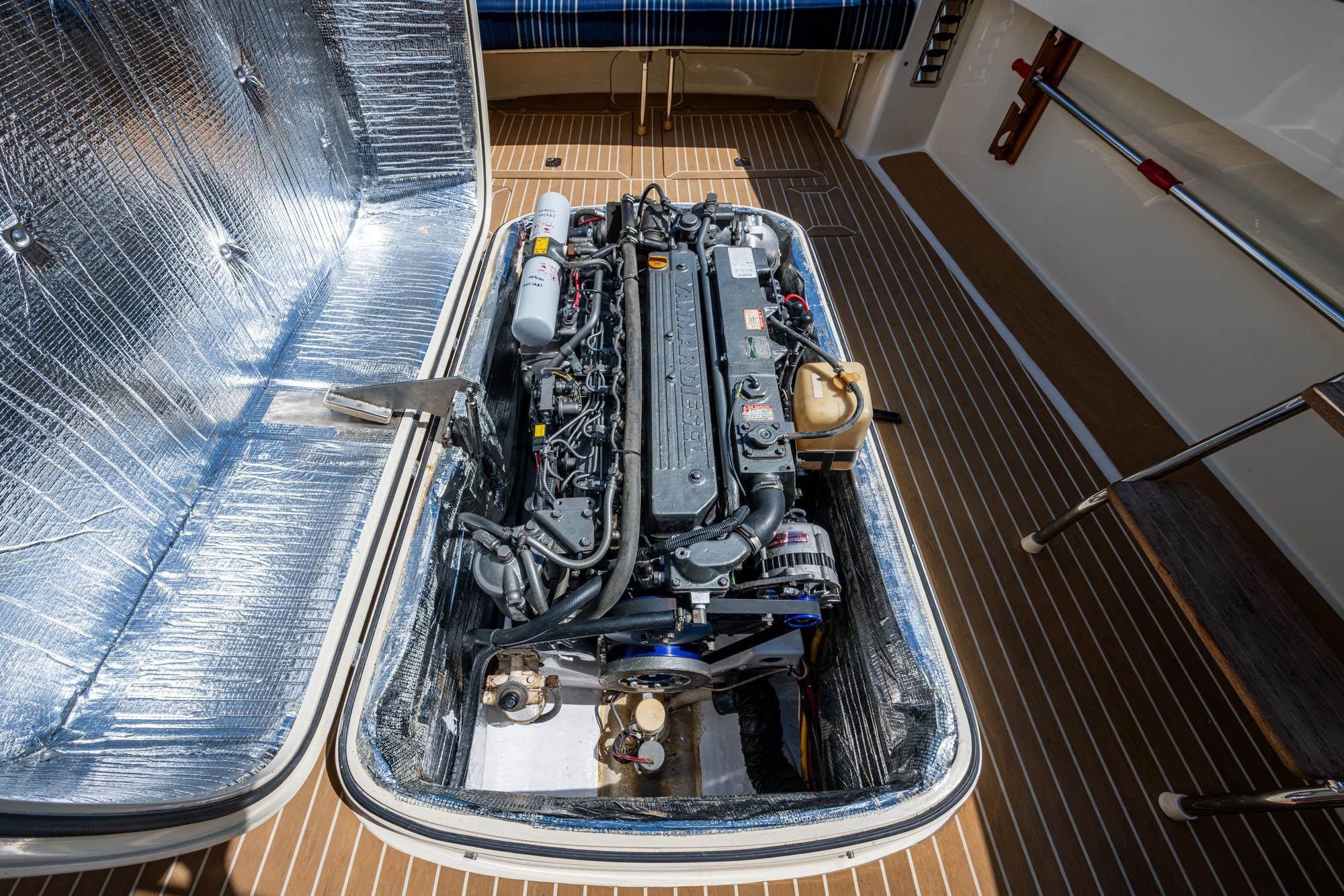 Engine compartment of a 2001 Hinckley Picnic Boat Classic, showcasing detailed mechanics.
