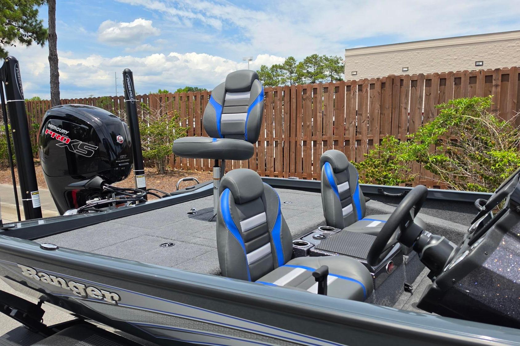 2026 Ranger RT188P boat with Mercury Pro XS engine, featuring blue and gray seating.