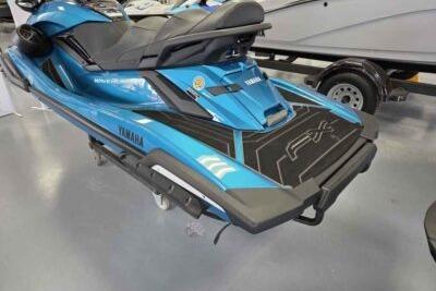 2026 Yamaha WaveRunner FX Cruiser SVHO in blue, displayed indoors.
