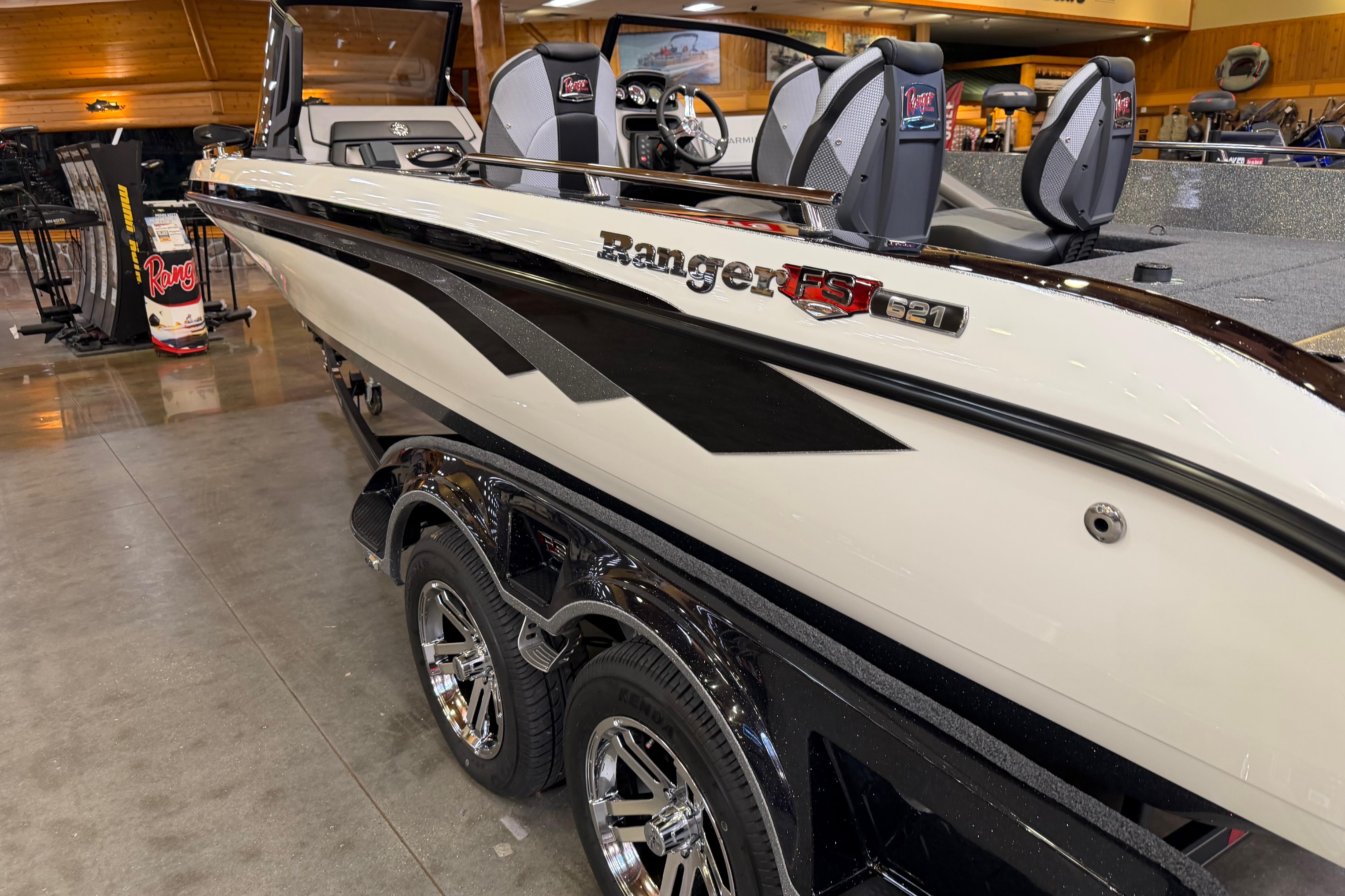 2026 Ranger 621FS Cup-Equipped boat displayed indoors, showcasing sleek design and modern features.