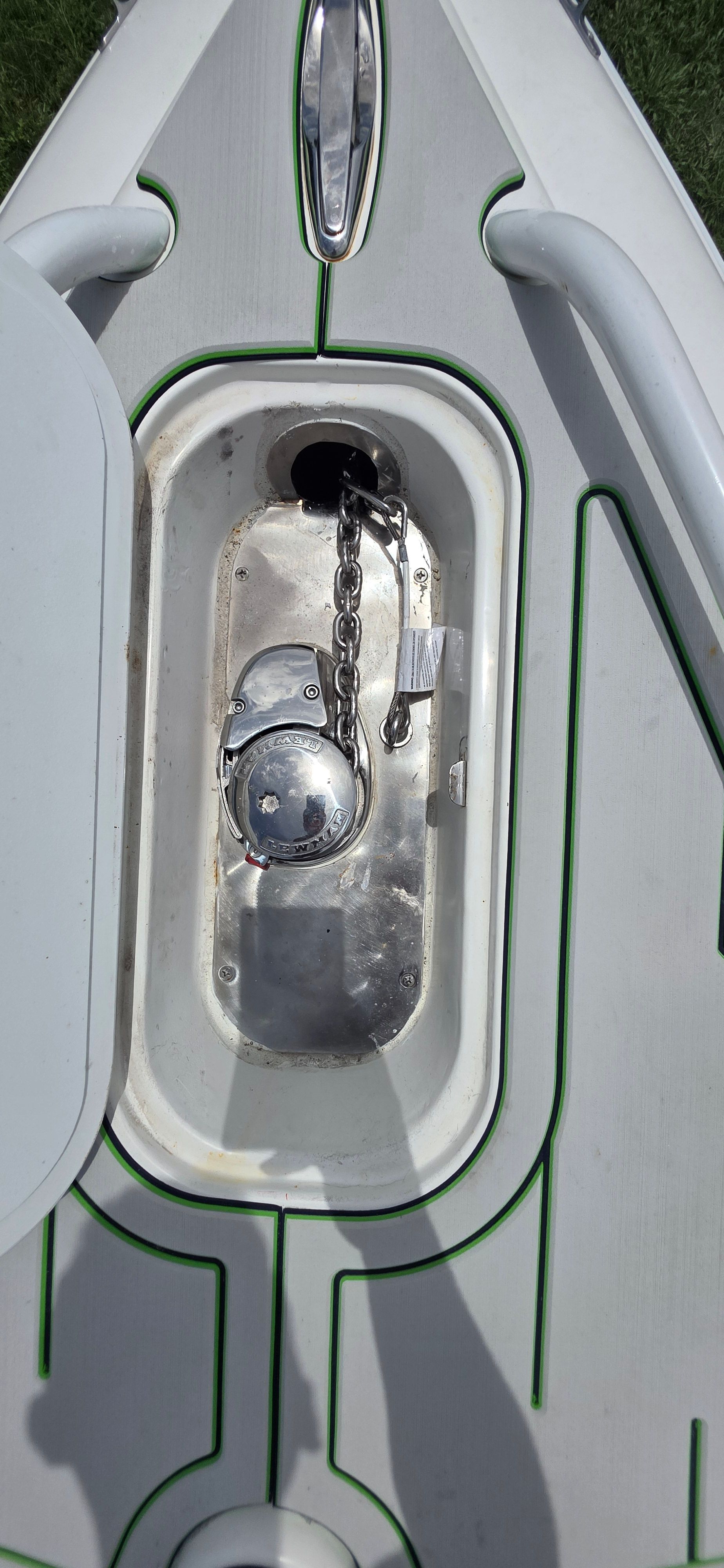Anchor locker of a 2013 Renegade 32 FT boat with chain.