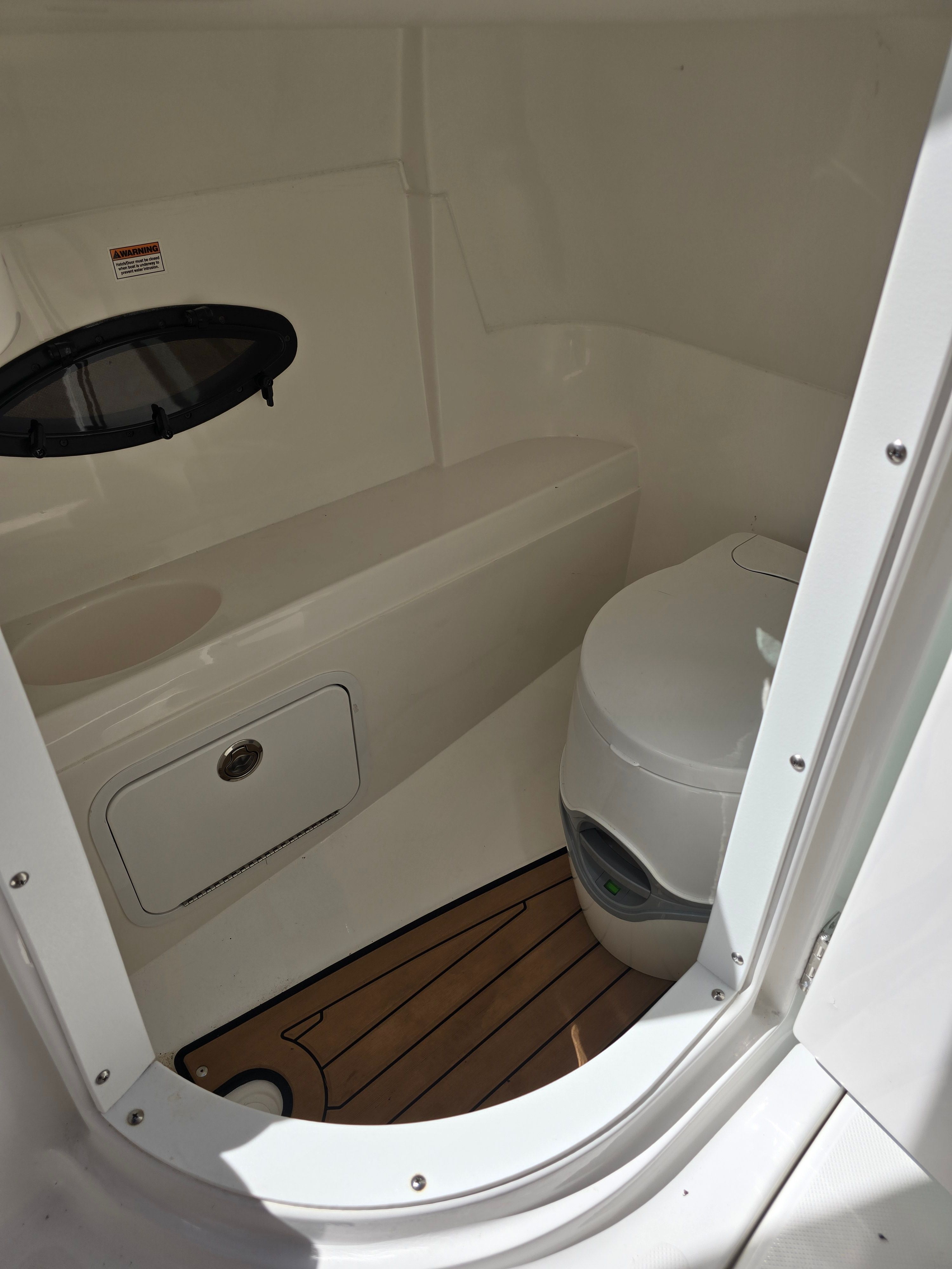 Interior of a 2016 Hurricane SD 2200 with toilet.