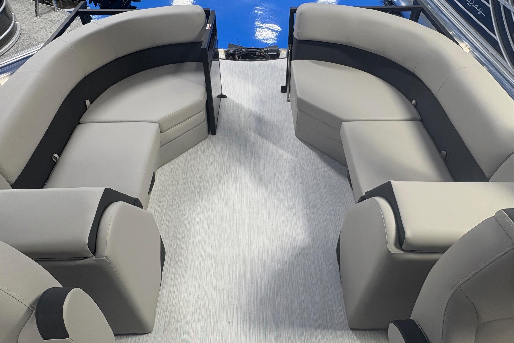 Luxurious seating on 2026 Dockside 22DQ boat, featuring modern design and comfortable upholstery.
