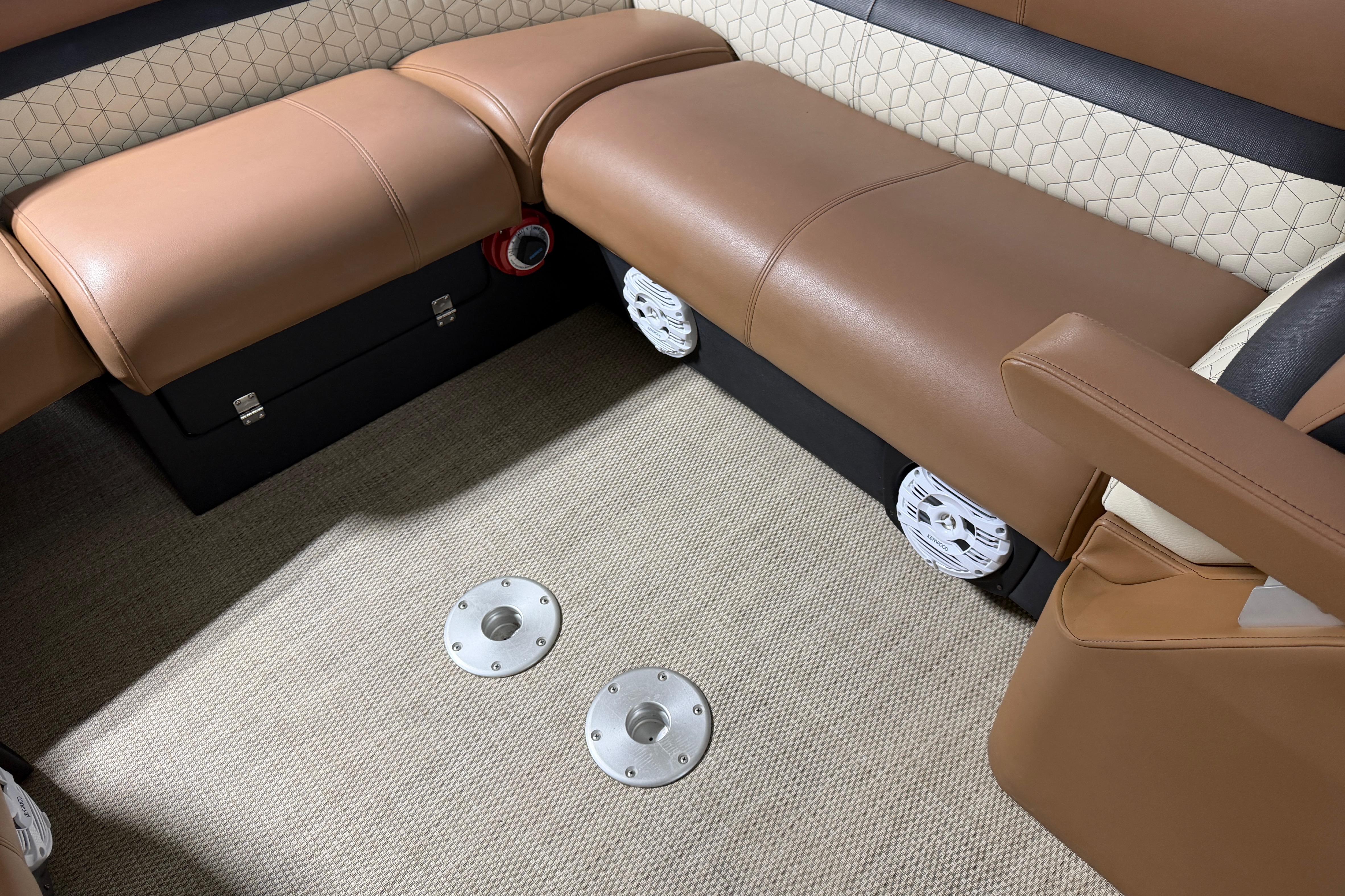 Luxurious seating area in a 2018 Godfrey Sanpan 2500 ULC pontoon boat interior.