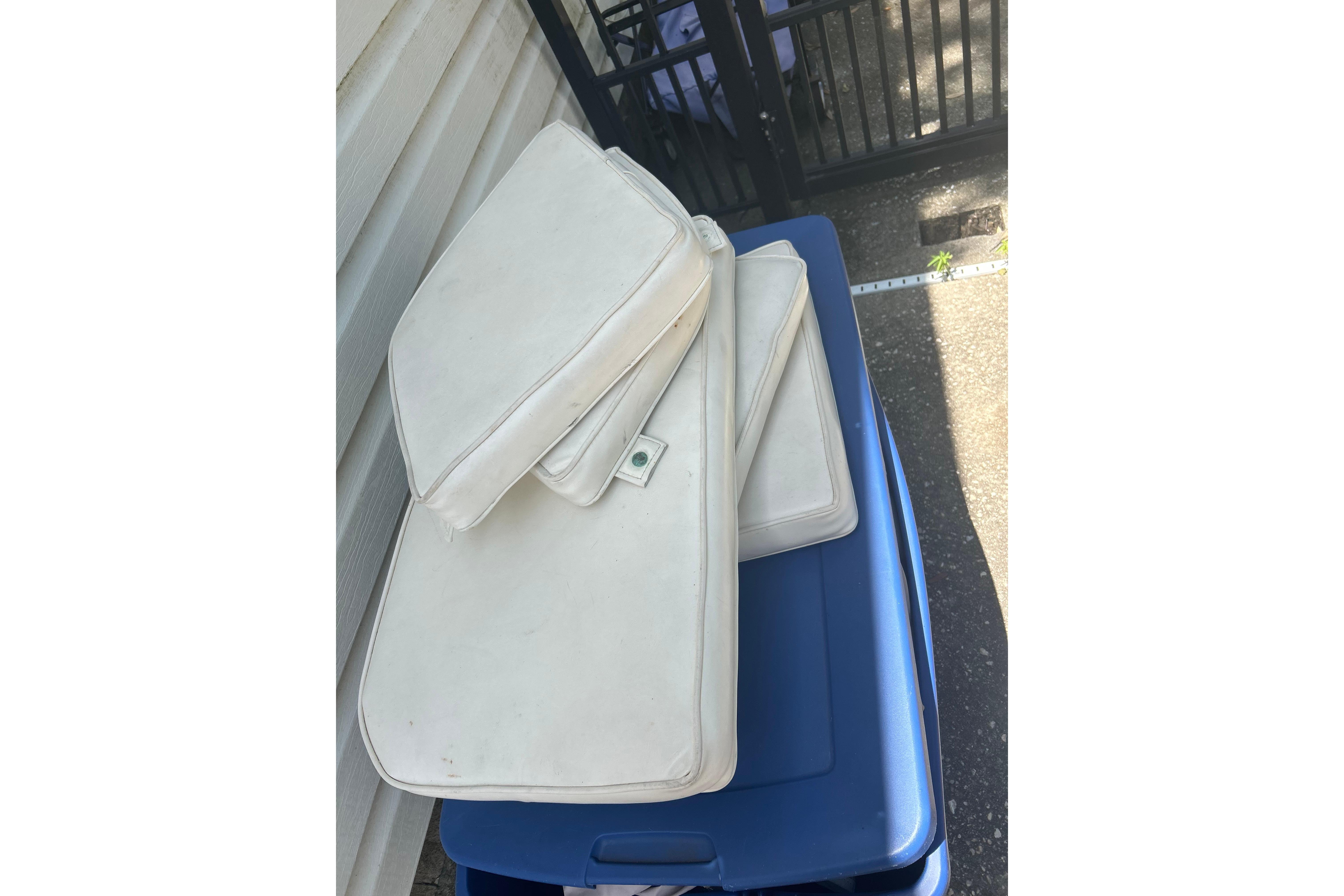 White boat cushions on a blue container, Grady-White Seafarer 226, 1987 model.