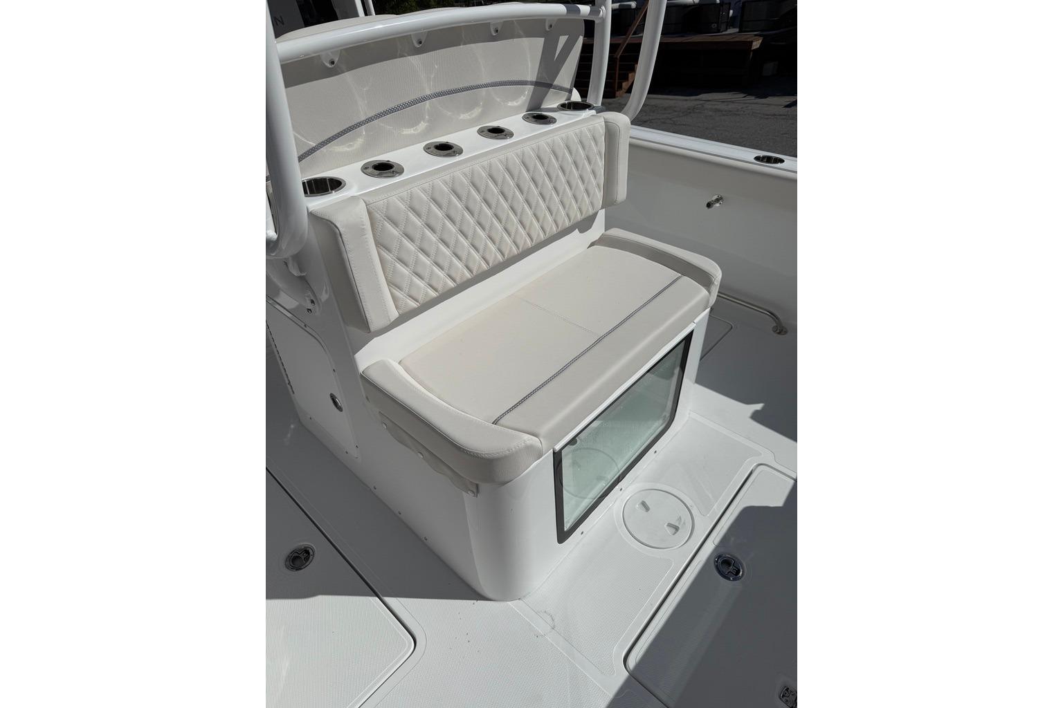 2026 Sea Hunt Ultra 285 Coffin Box with cushioned seating and integrated storage.