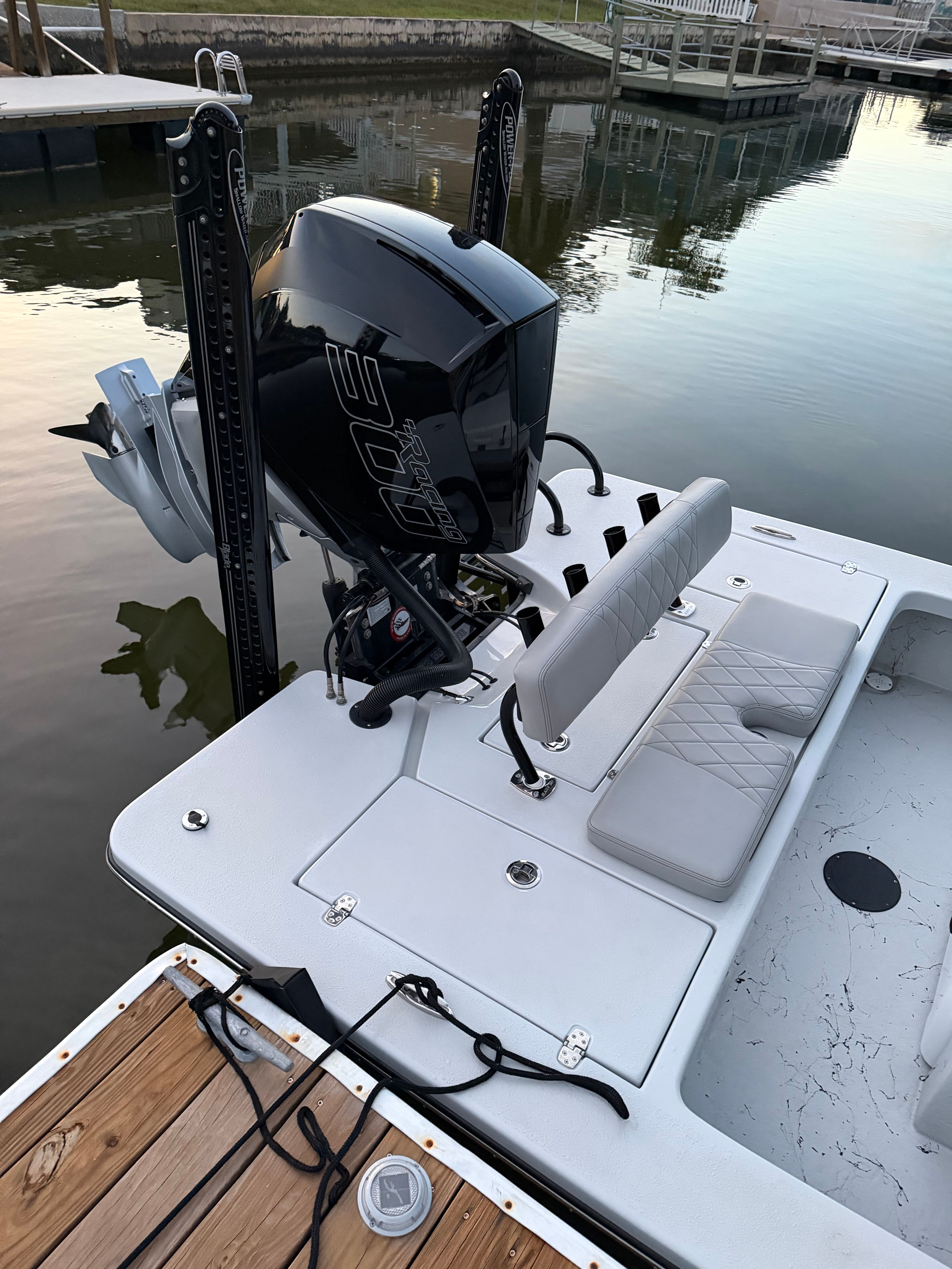The image shows the stern of a 2022 Blazer Bay 2420 GTS boat with a powerful outboard motor.