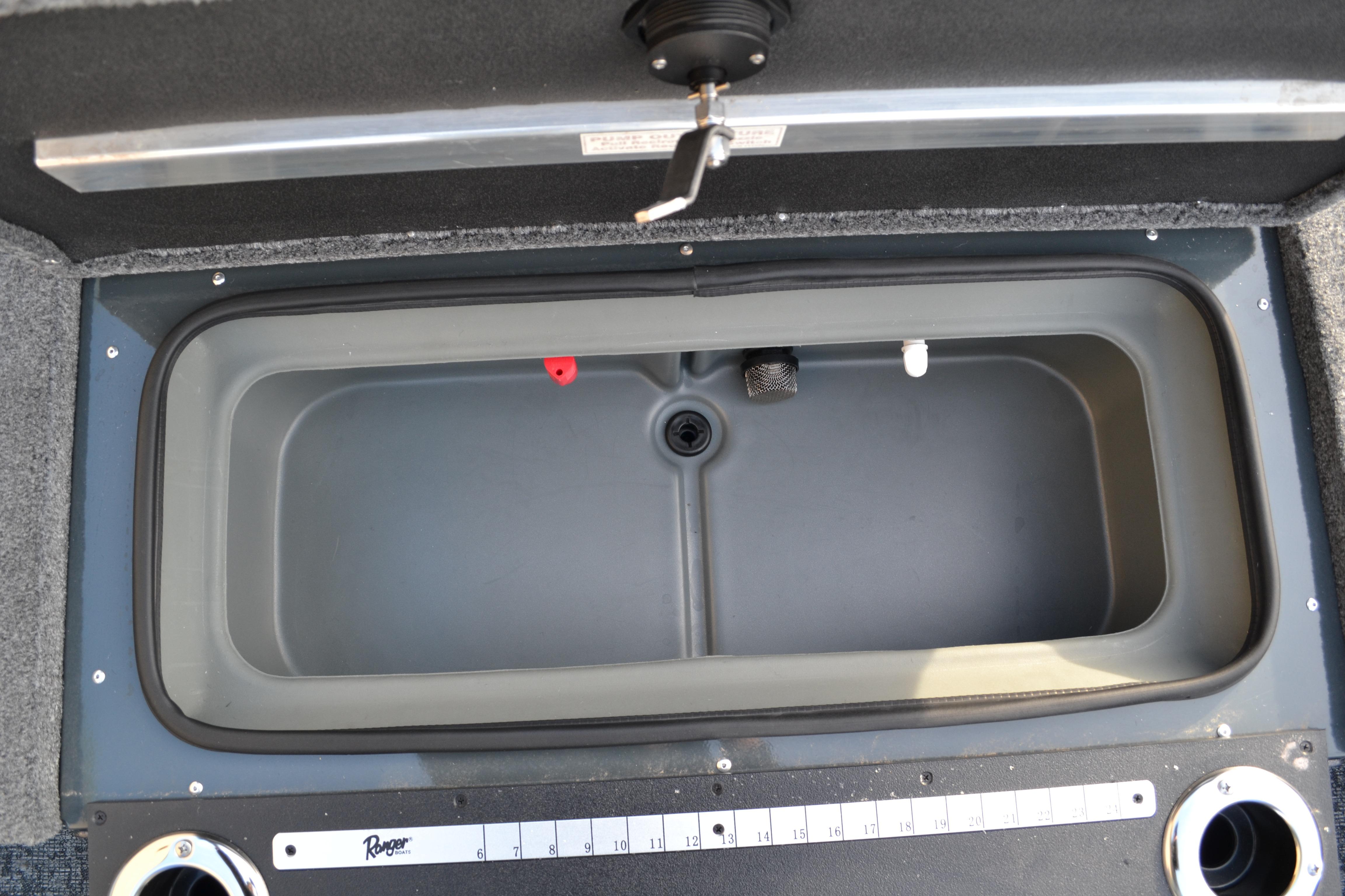 2026 Ranger VX1888 WT boat livewell with measurement scale and cup holders.