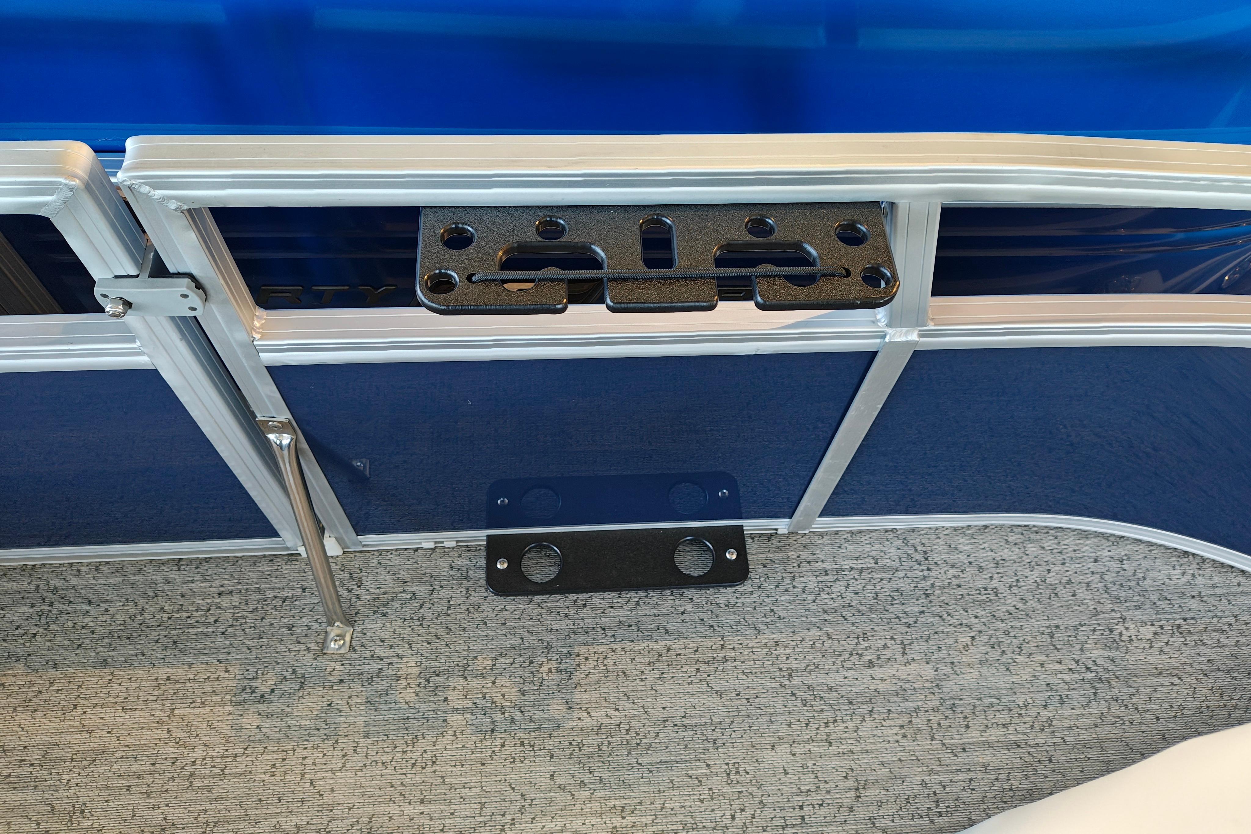 2026 Sun Tracker Bass Buggy 16 XL Select pontoon boat interior detail with blue paneling.