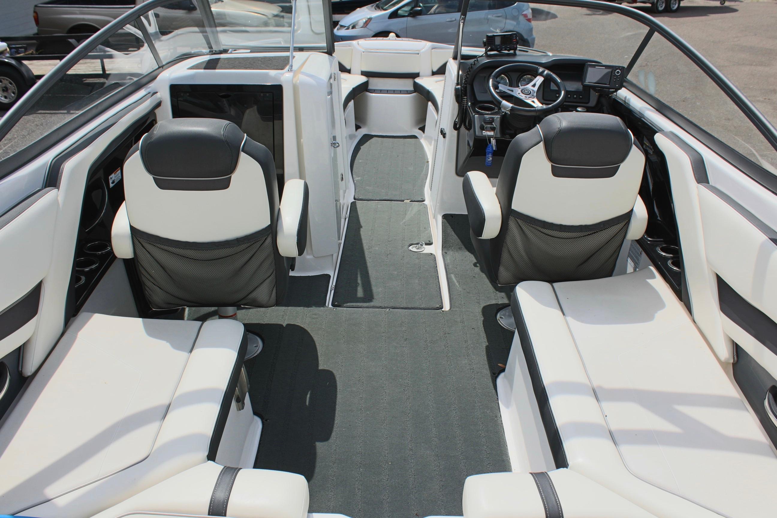Interior of 2016 Yamaha Boats 242 Limited S, featuring sleek seating and modern controls.