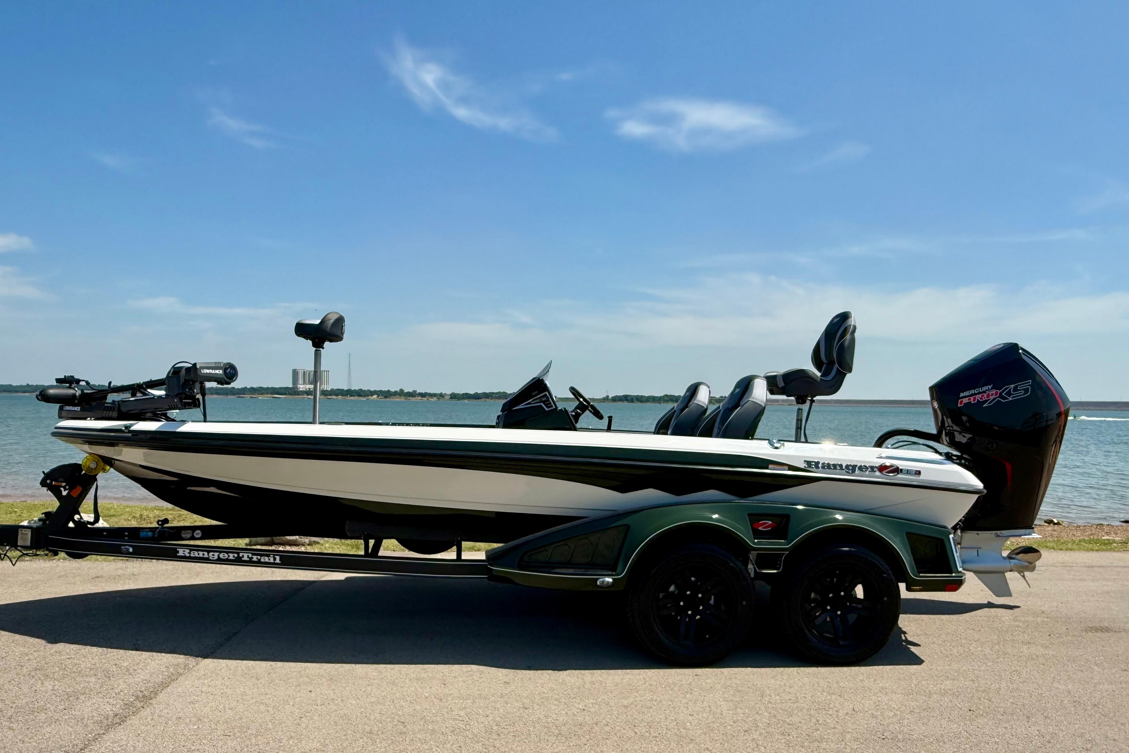 2026 Ranger Z519R boat by the water, featuring sleek design and powerful engine.