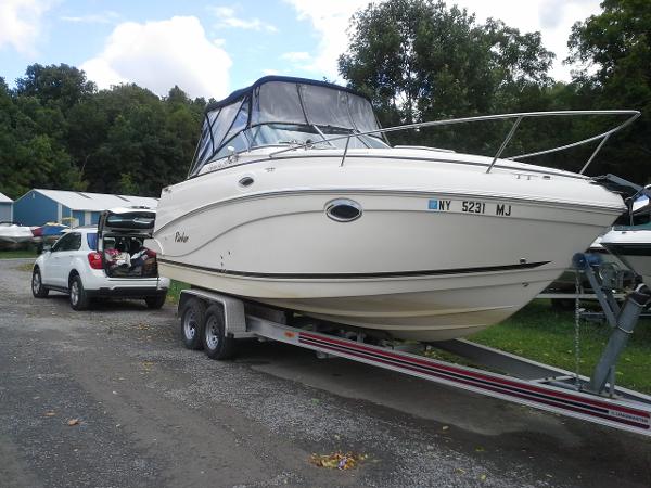2004 Rinker Fiesta Vee 250 on trailer, ready for transport.
