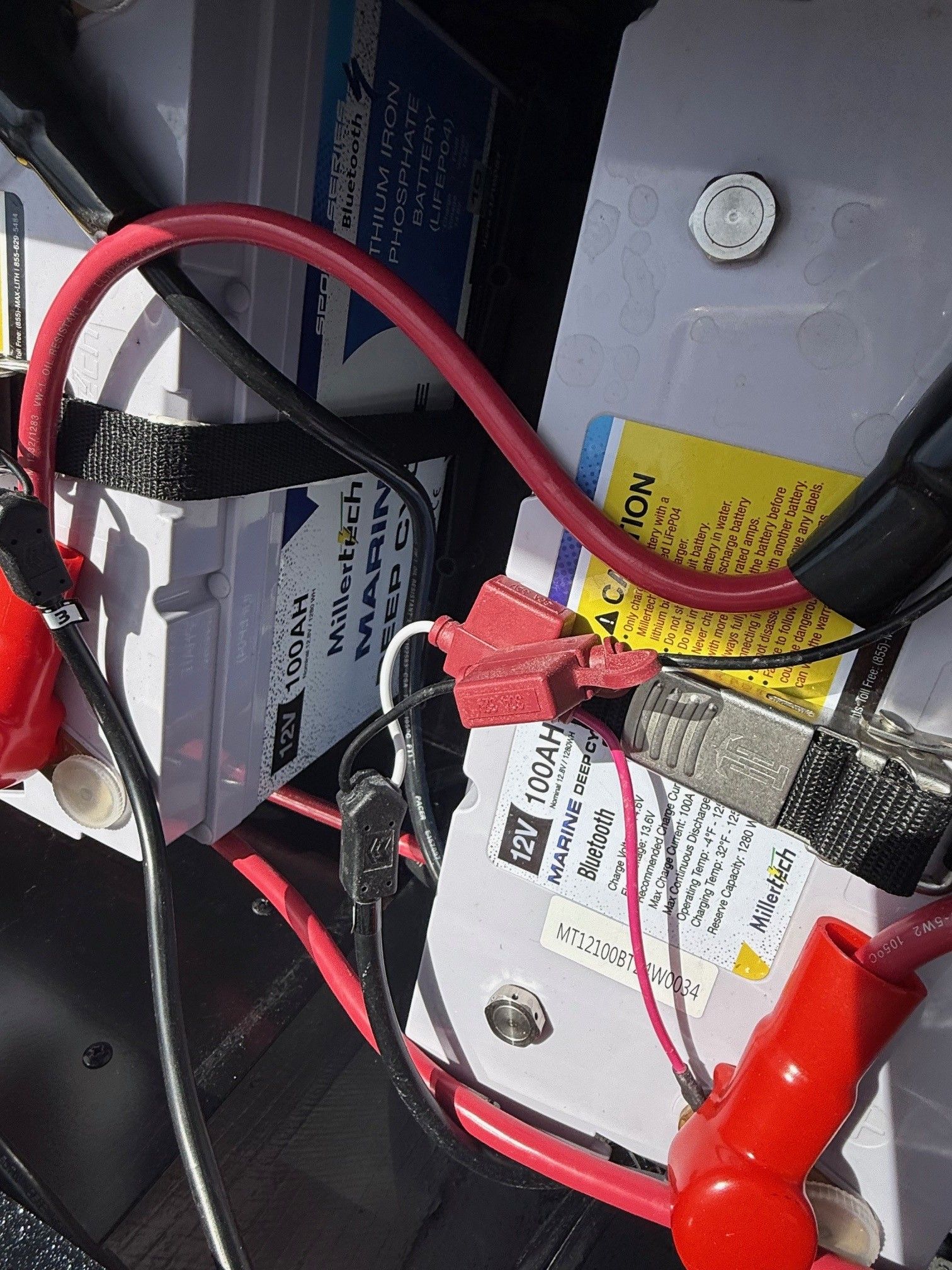 Phoenix 721 ZXL 2025 boat battery with cables and connectors.