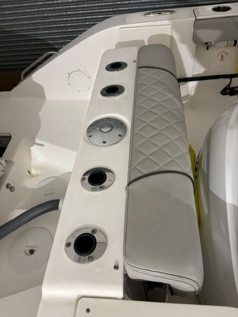 Interior view of a 2022 Pursuit C 238 Center Console boat.