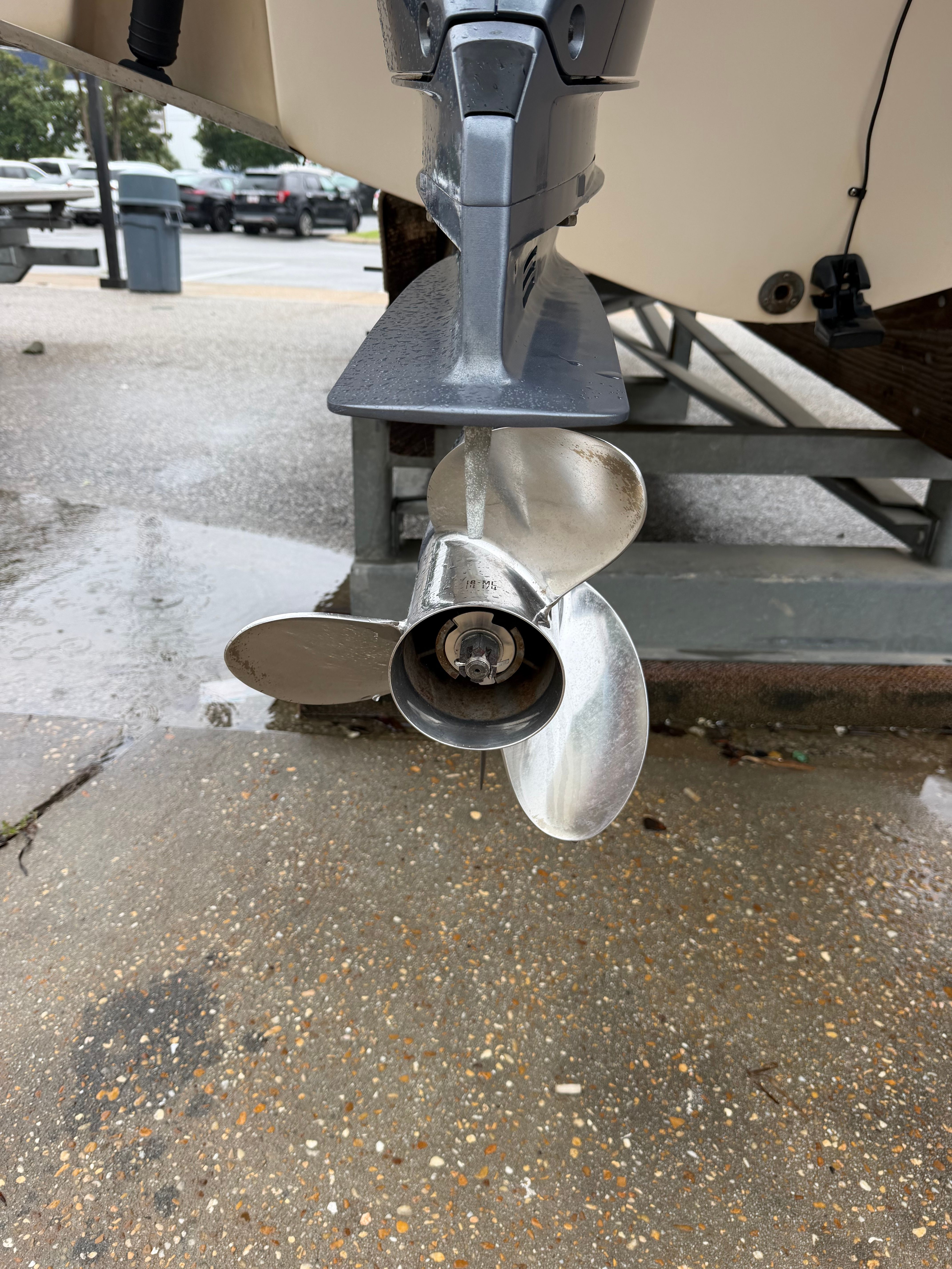 Close-up of a boat propeller on a trailer.