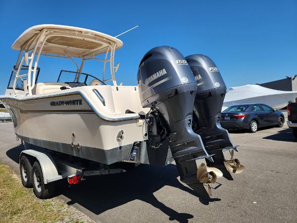 2015 Grady-White Freedom 275 boat with twin Yamaha engines on a trailer.