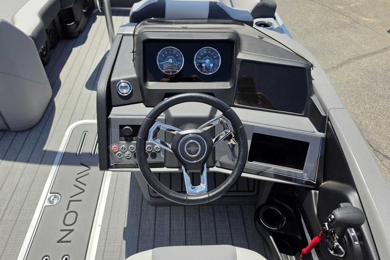 2026 Avalon Catalina Quad Lounge Shift boat dashboard with steering wheel and controls.
