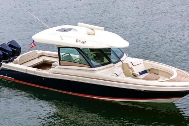 2023 Chris-Craft Calypso 35 boat on water, featuring sleek design and modern amenities.
