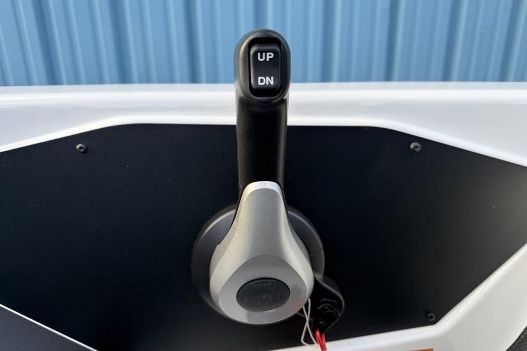 Throttle control lever on 2026 Skeeter ZXR19 SE boat dashboard.