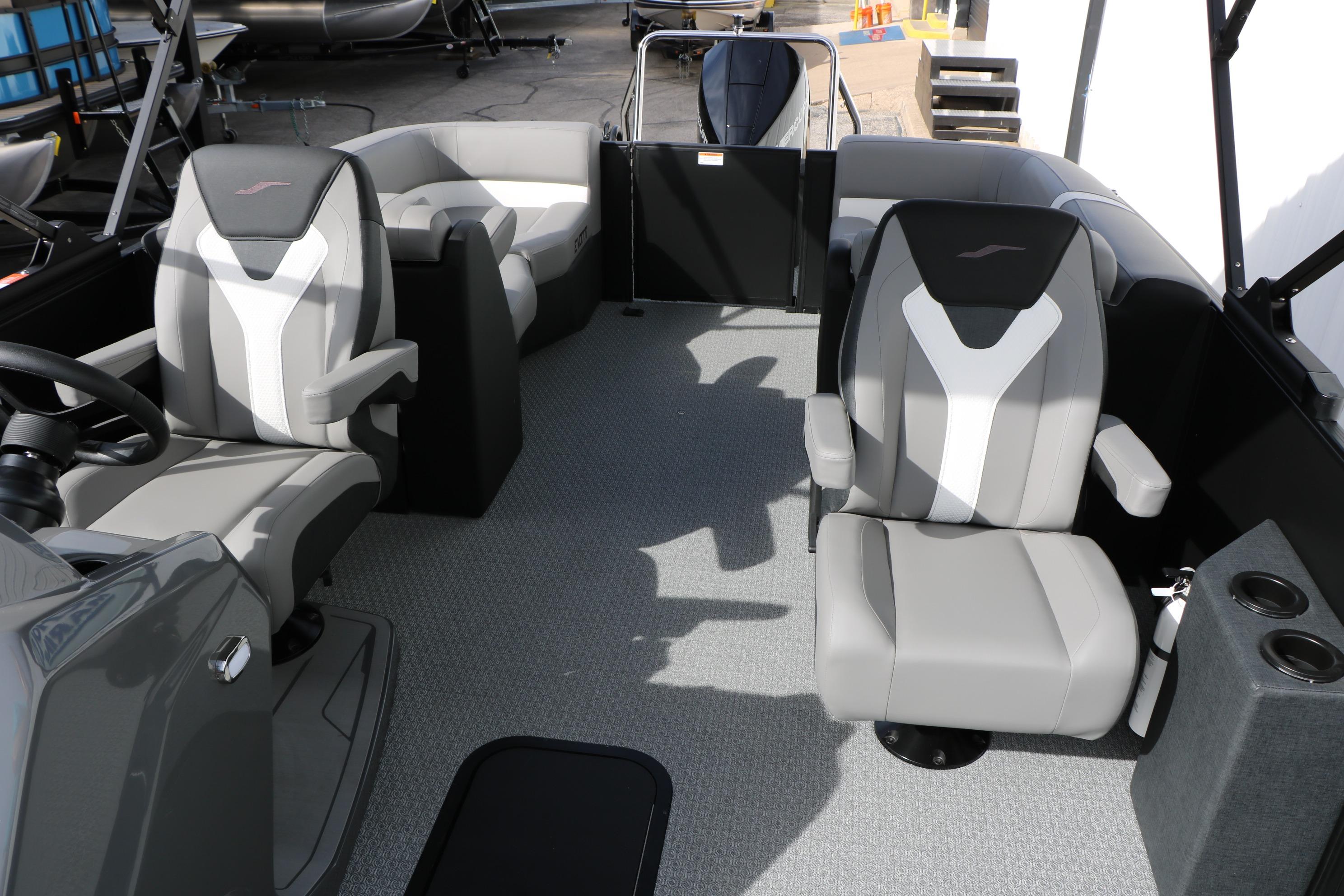 Interior of 2026 Evotti 521QL boat with modern seating and sleek design.
