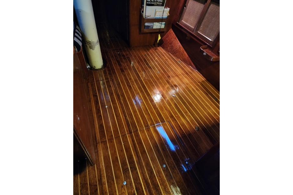 Polished wooden interior of 1984 Bristol 45.5 Center Cockpit sailboat.